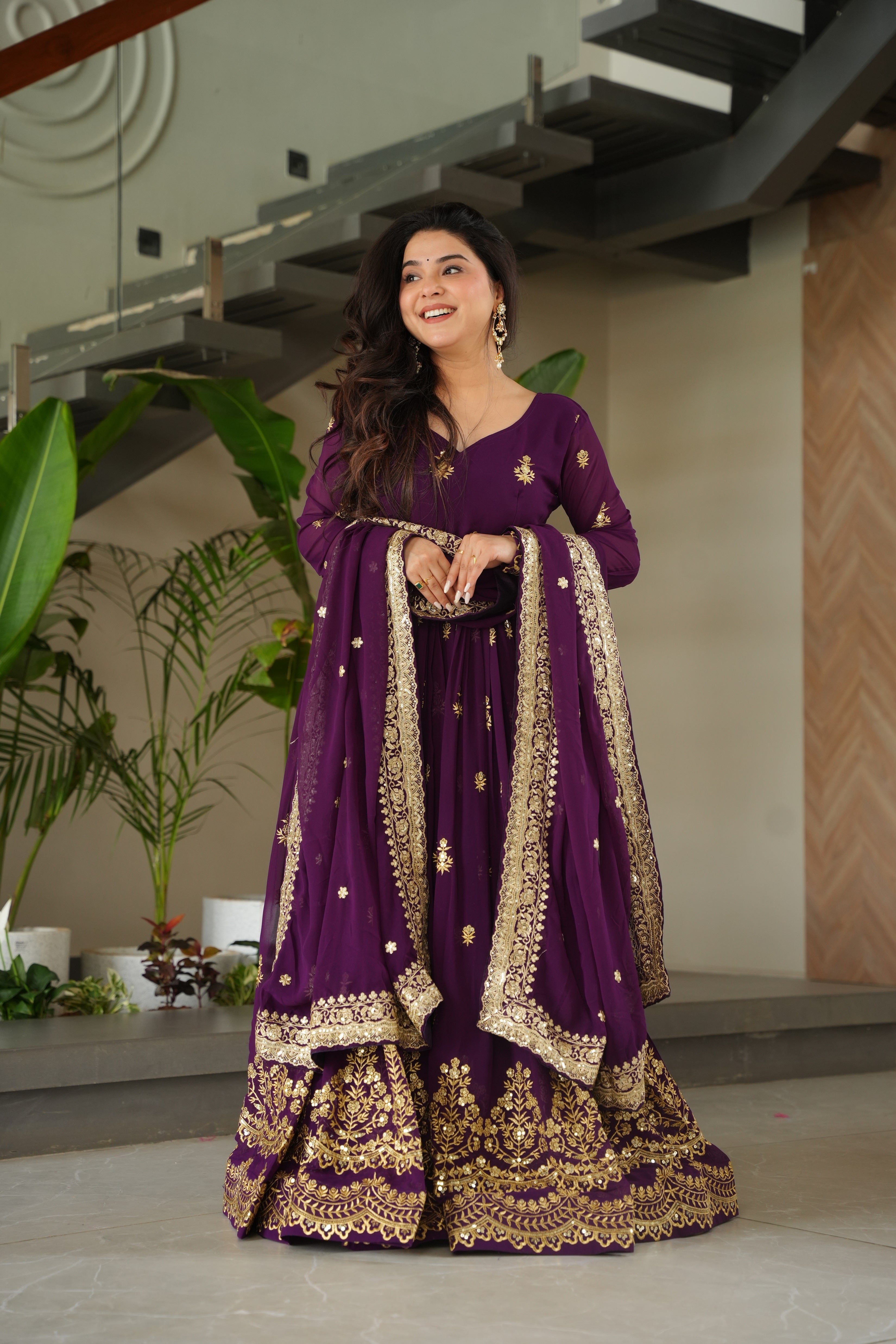 Rishita purple faux blooming zari sequins embroidered gown with dupatta