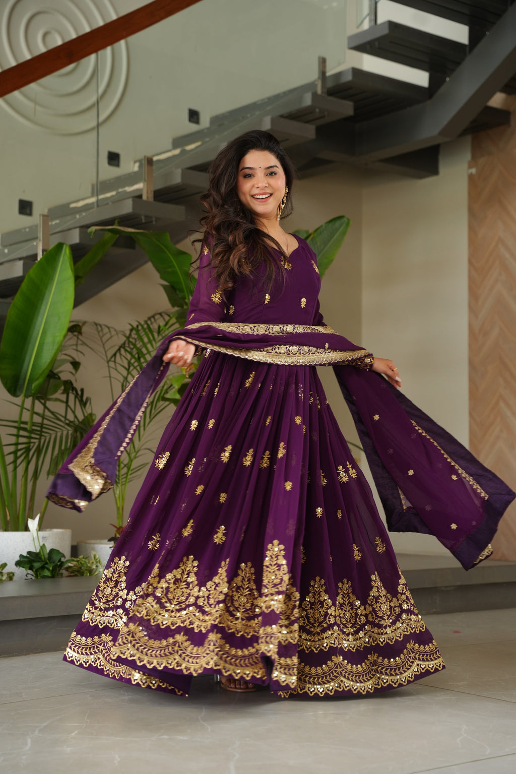 Rishita purple faux blooming zari sequins embroidered gown with dupatta