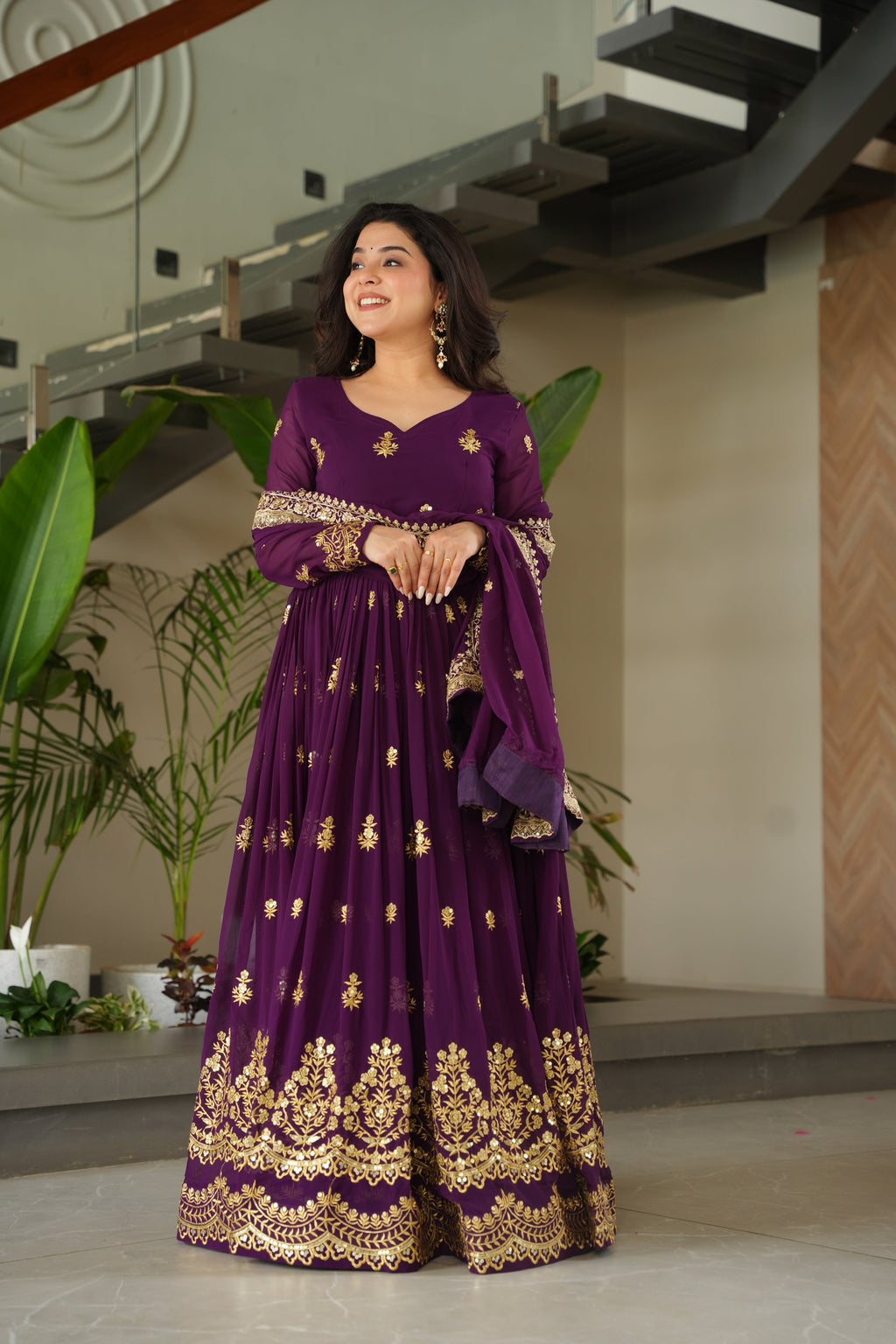 Rishita purple faux blooming zari sequins embroidered gown with dupatta