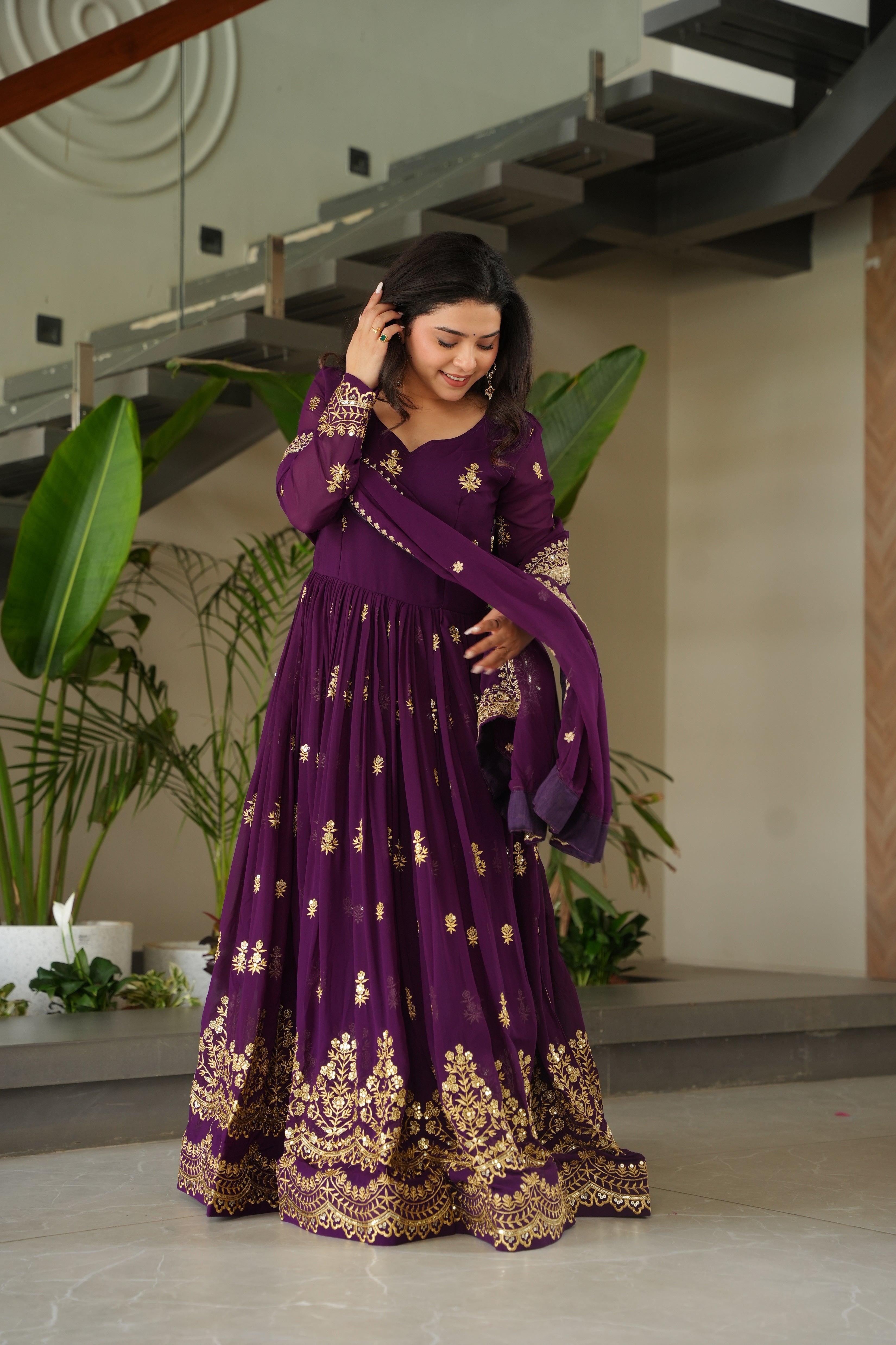 Rishita purple faux blooming zari sequins embroidered gown with dupatta