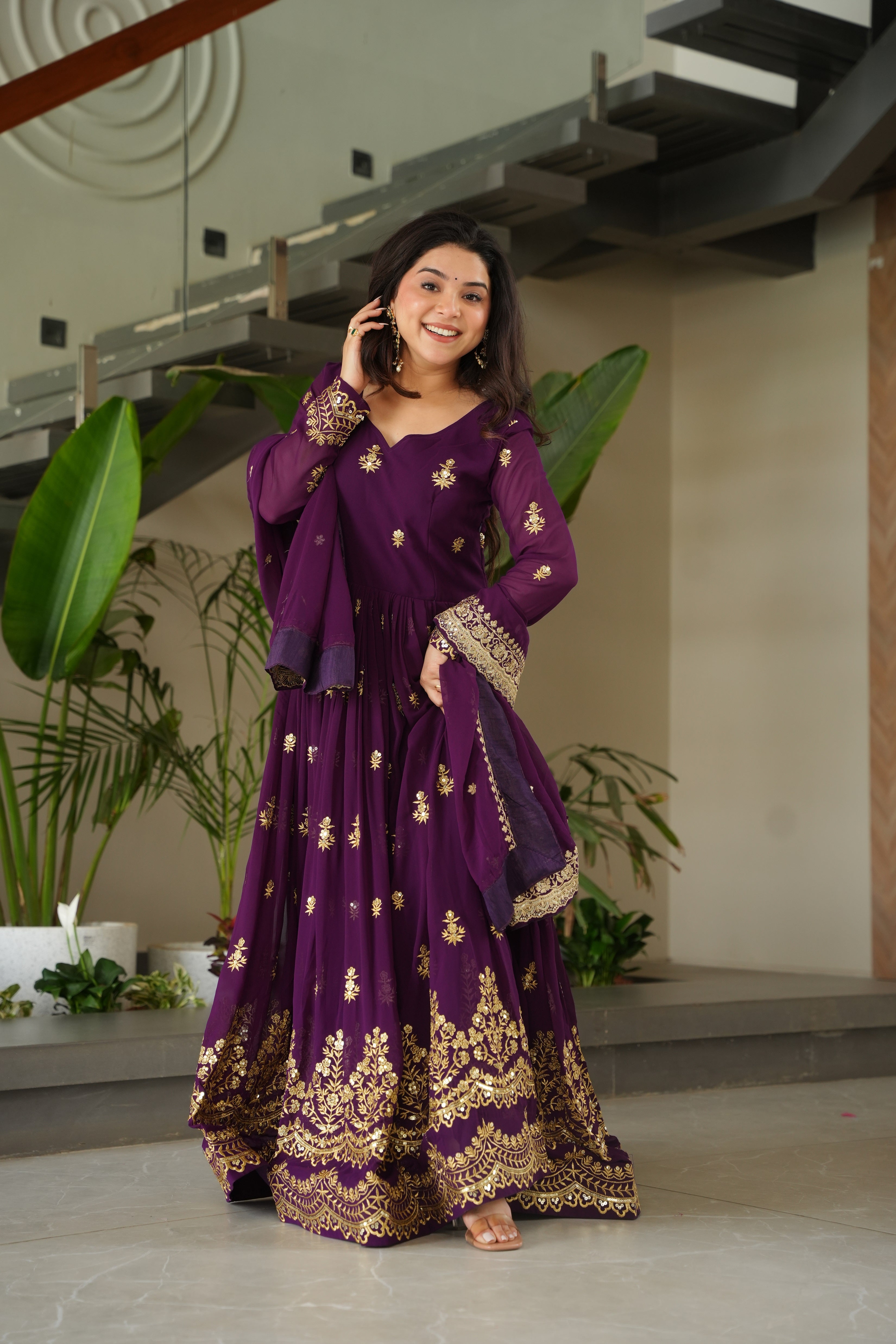 Rishita purple faux blooming zari sequins embroidered gown with dupatta