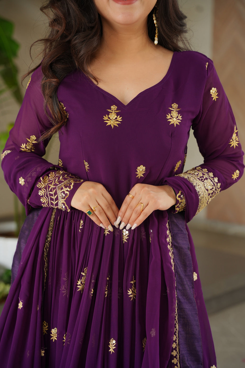 Rishita purple faux blooming zari sequins embroidered gown with dupatta