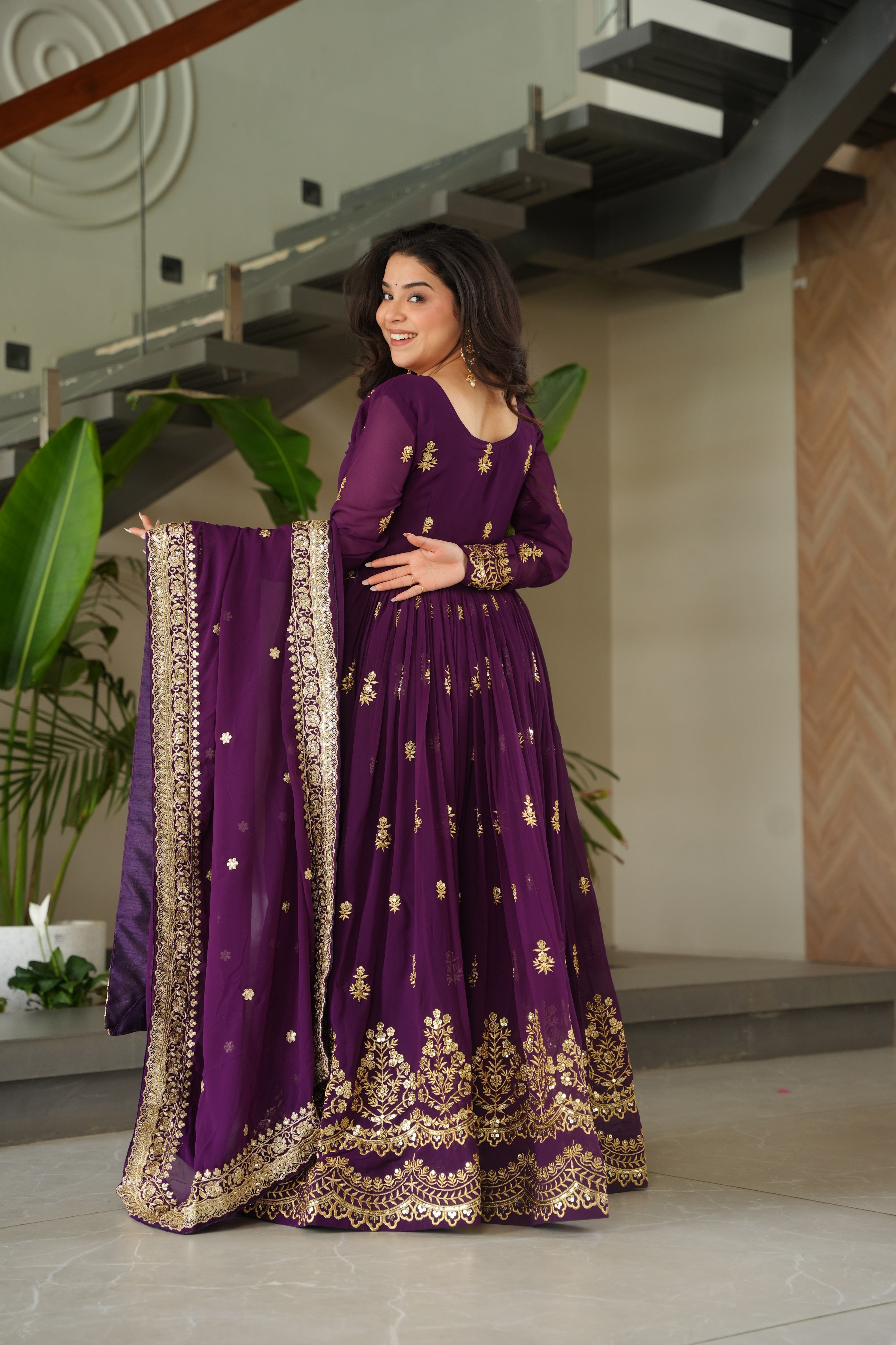 Rishita purple faux blooming zari sequins embroidered gown with dupatta