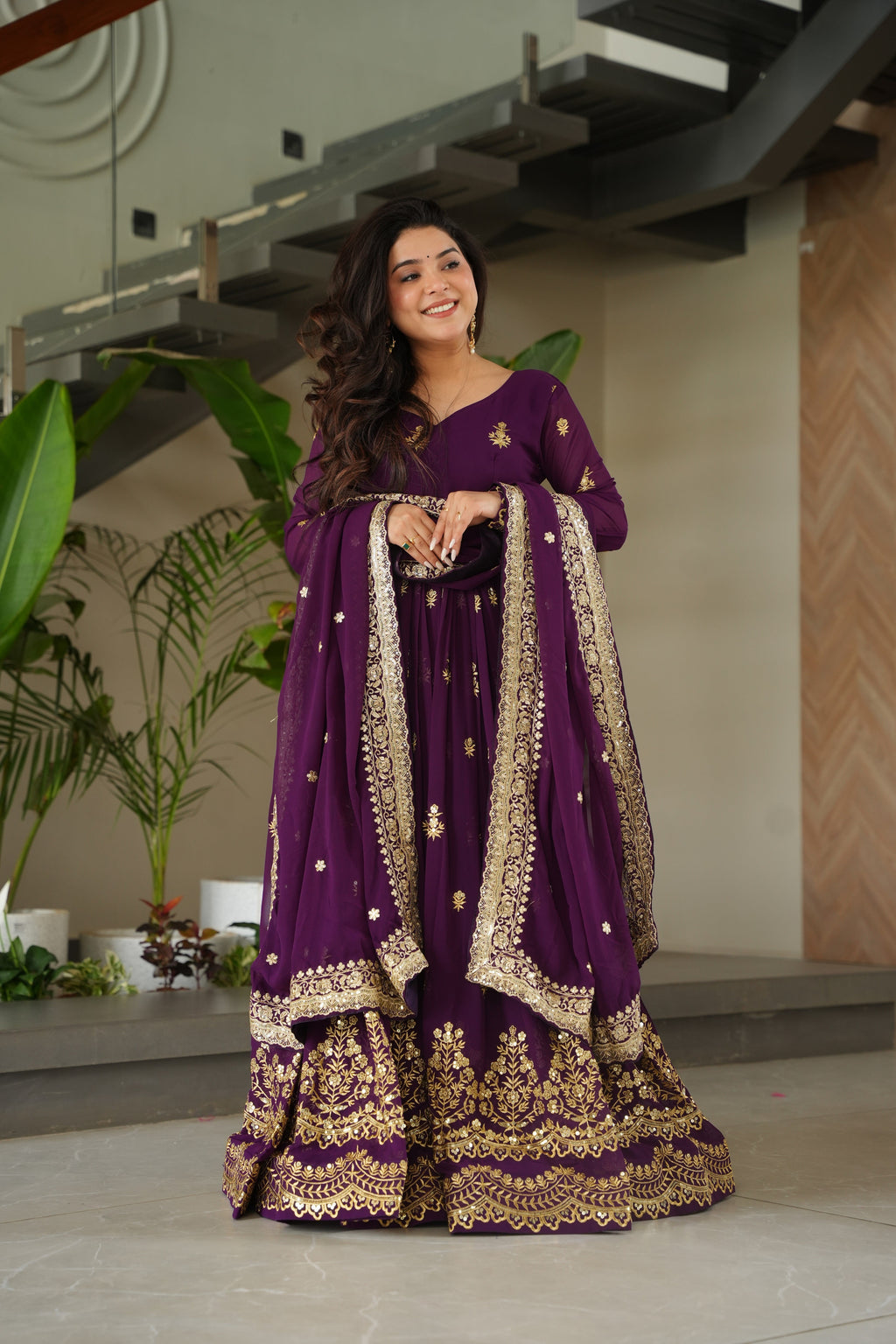 Rishita purple faux blooming zari sequins embroidered gown with dupatta
