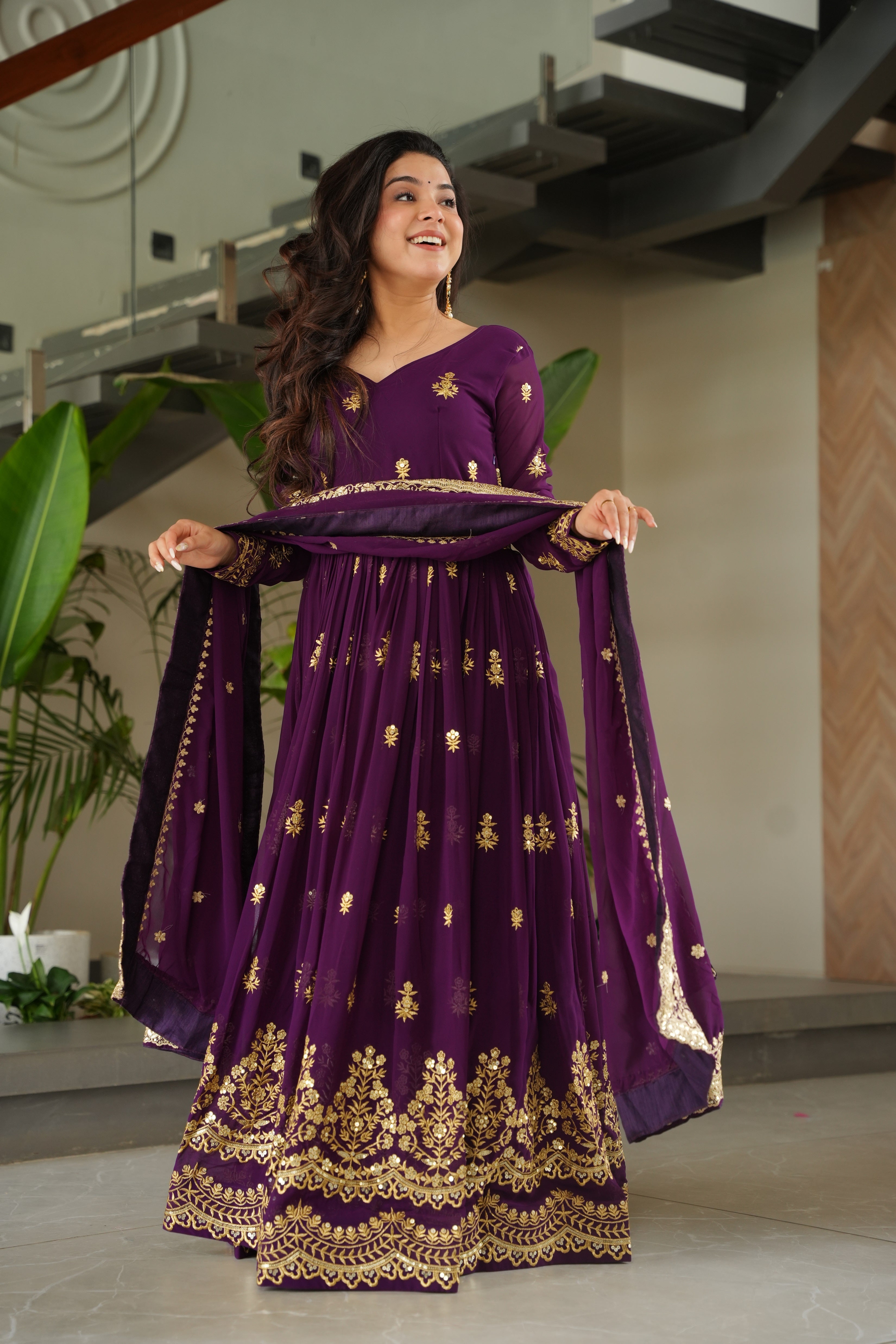 Rishita purple faux blooming zari sequins embroidered gown with dupatta