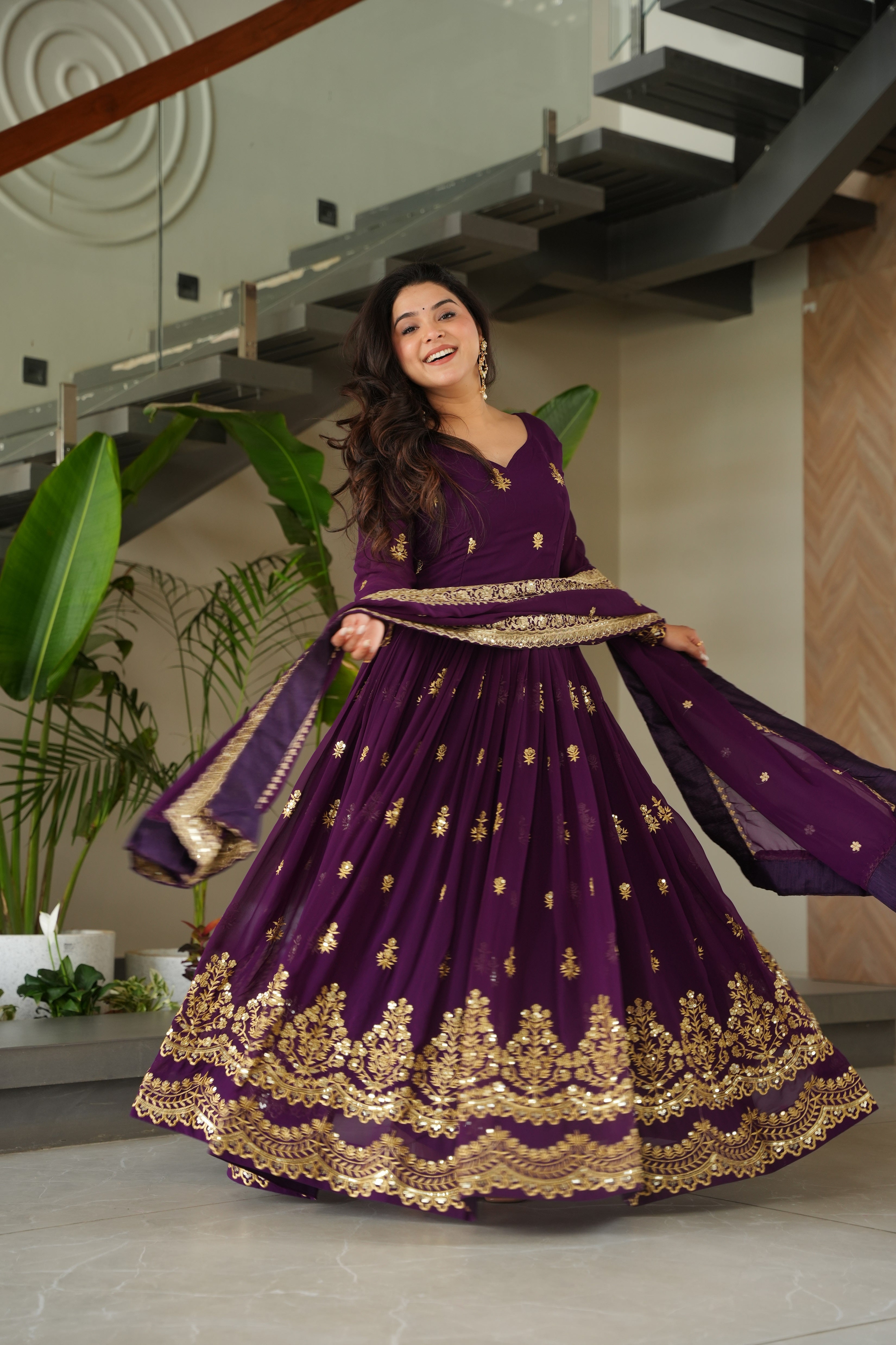 Rishita purple faux blooming zari sequins embroidered gown with dupatta