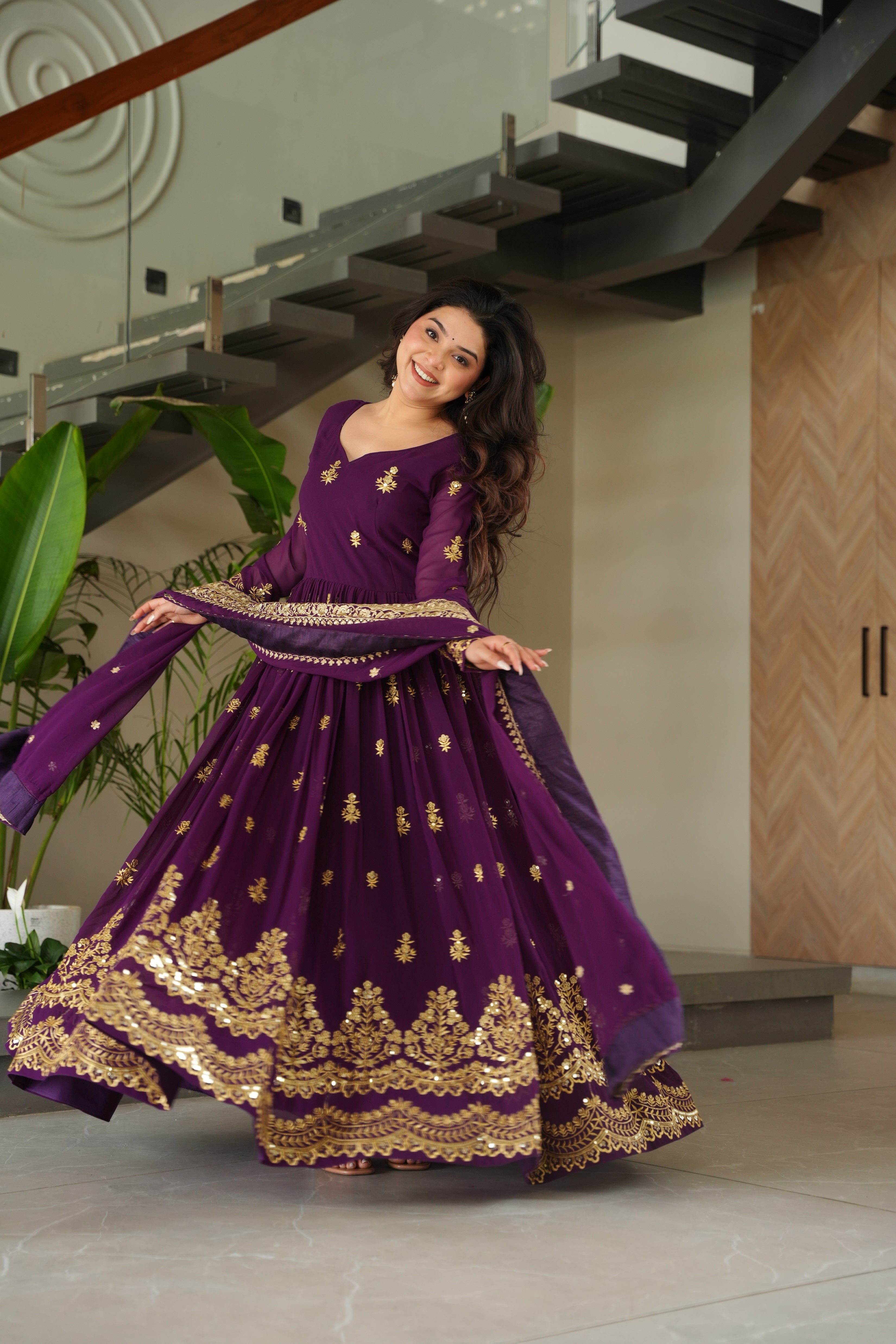 Rishita purple faux blooming zari sequins embroidered gown with dupatta
