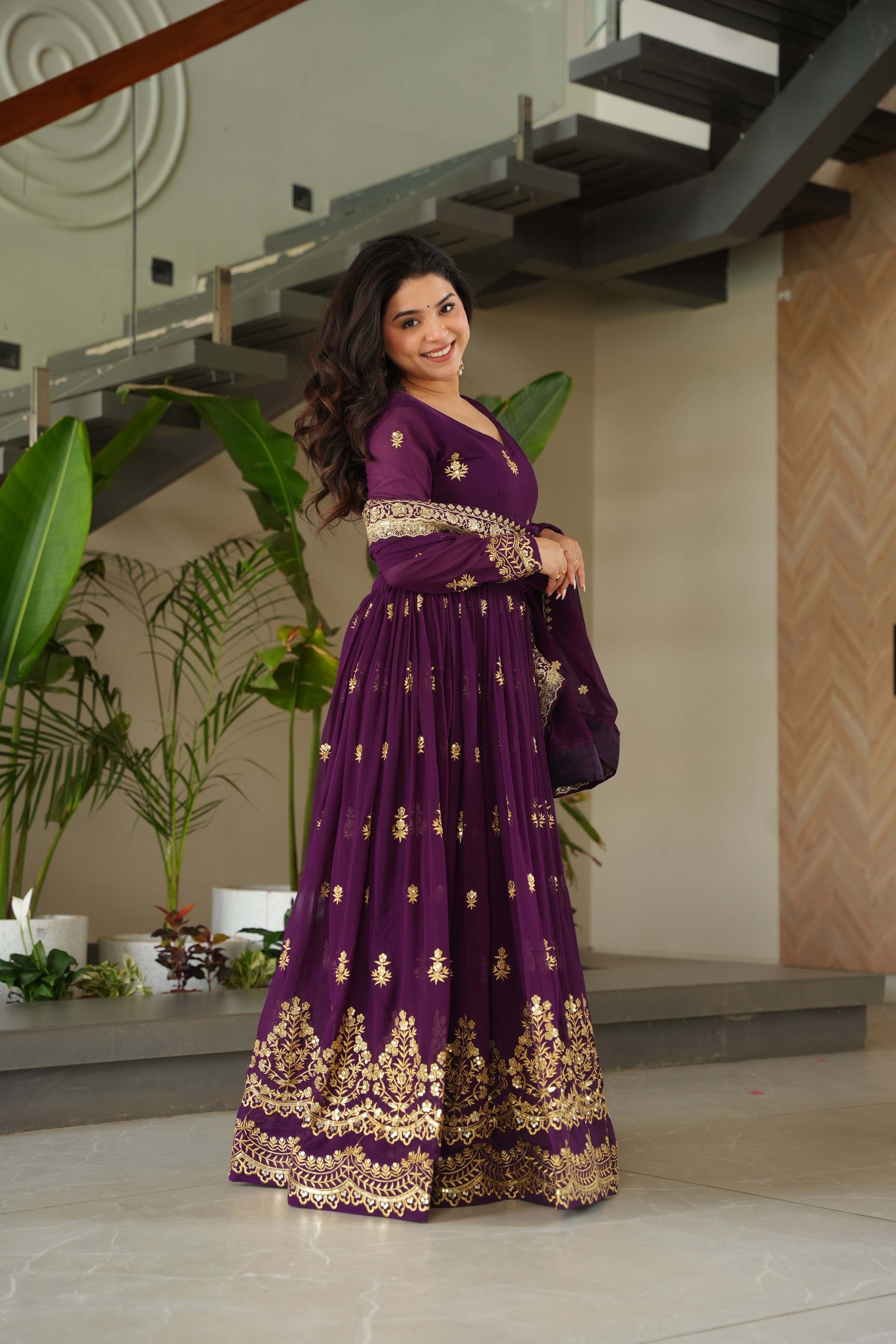 Rishita purple faux blooming zari sequins embroidered gown with dupatta