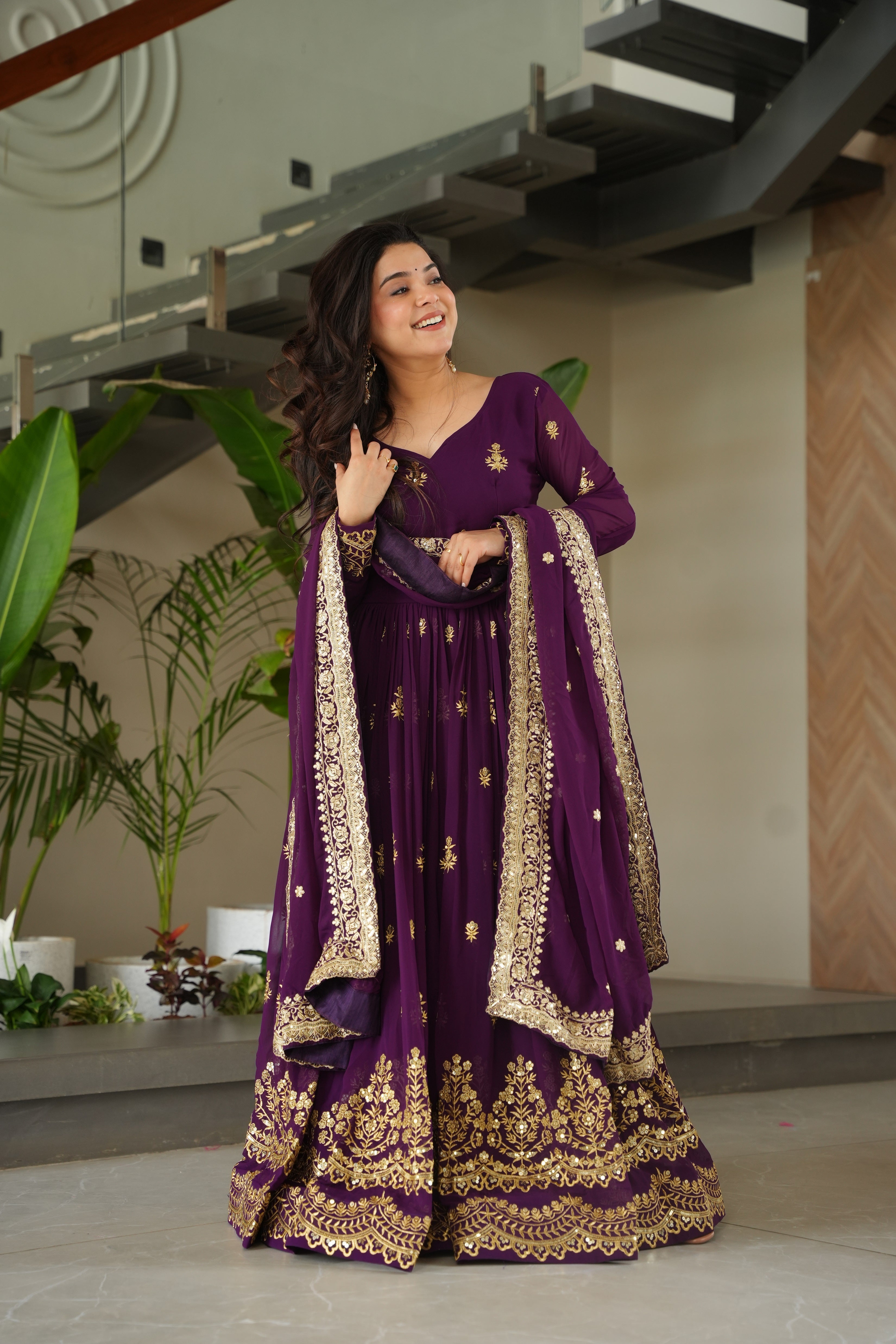 Rishita purple faux blooming zari sequins embroidered gown with dupatta