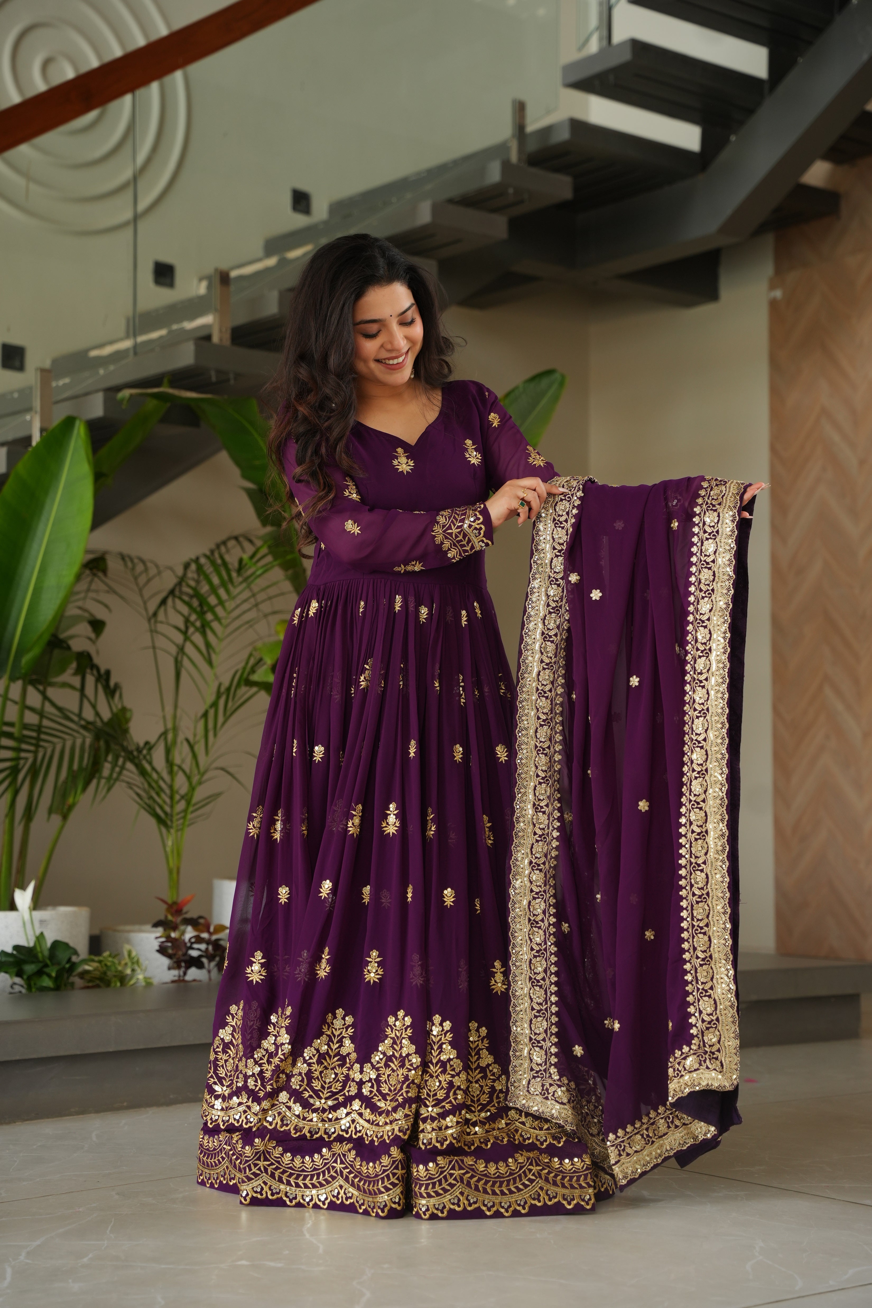Rishita purple faux blooming zari sequins embroidered gown with dupatta