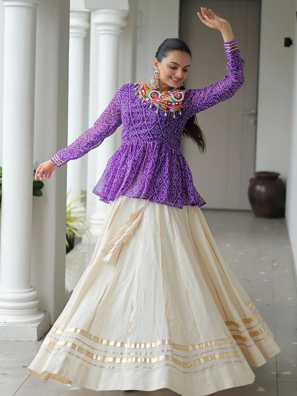 Elegant purple Kora cotton Navratri lehenga set with Bandhani print top and Gota Patti work