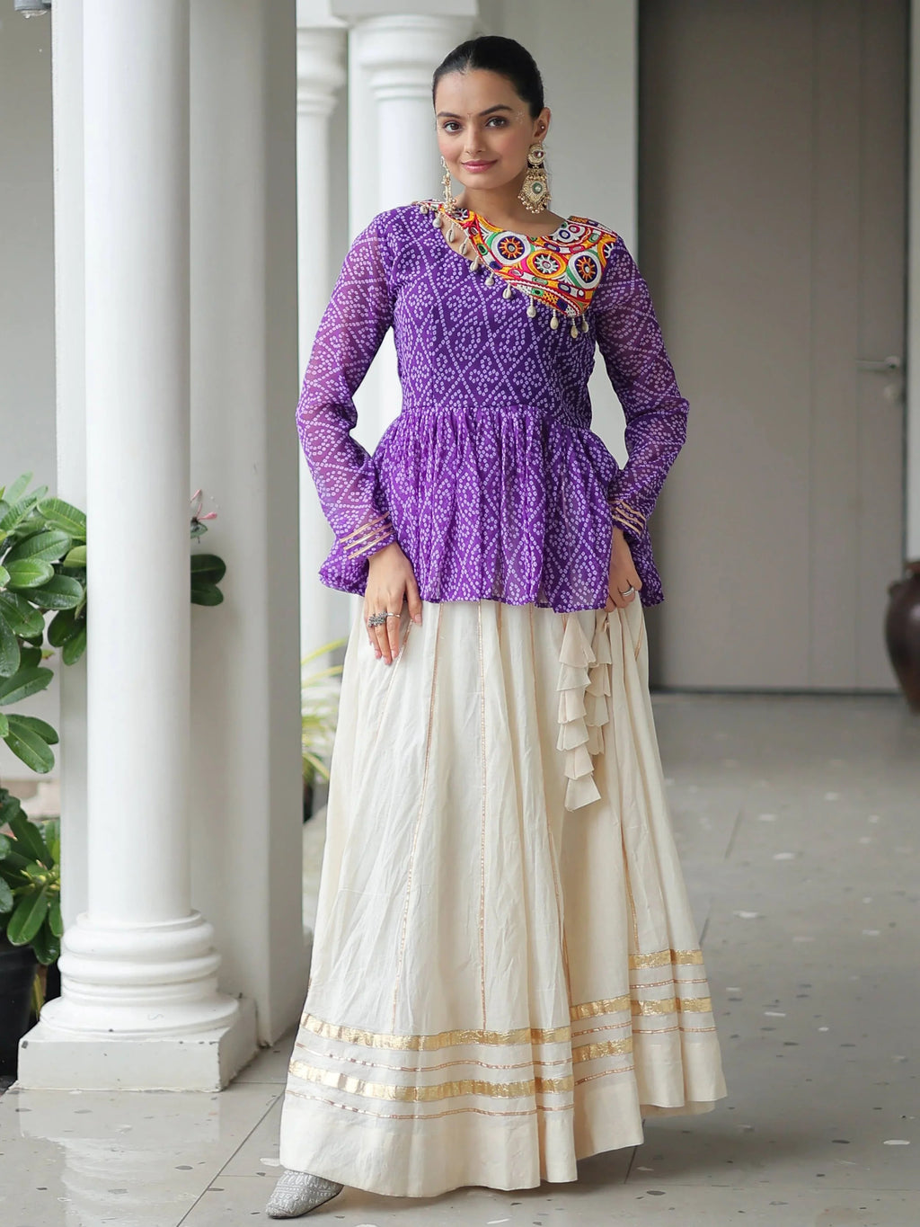Elegant purple Kora cotton Navratri lehenga set with Bandhani print top and Gota Patti work