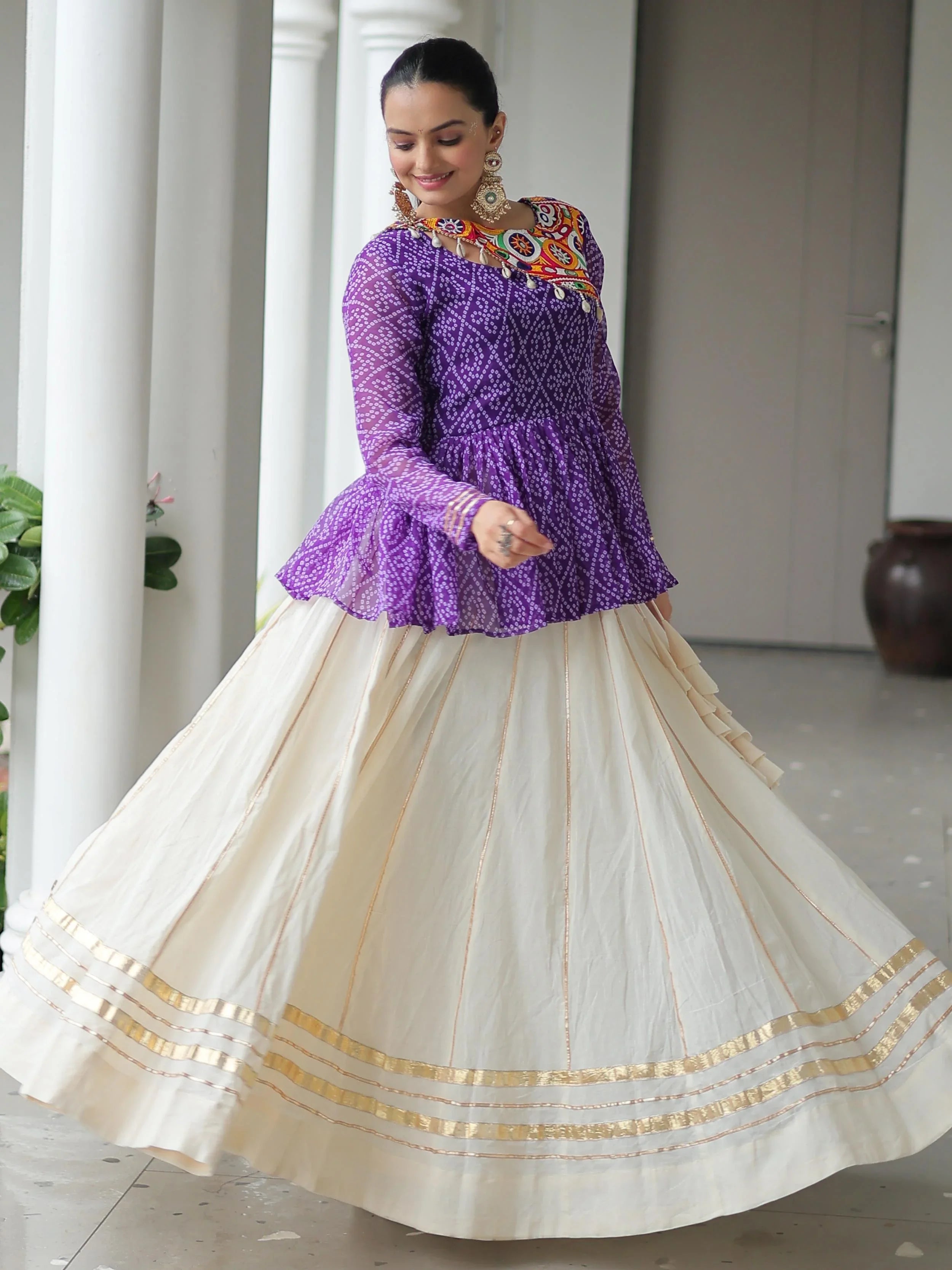 Elegant purple Kora cotton Navratri lehenga set with Bandhani print top and Gota Patti work
