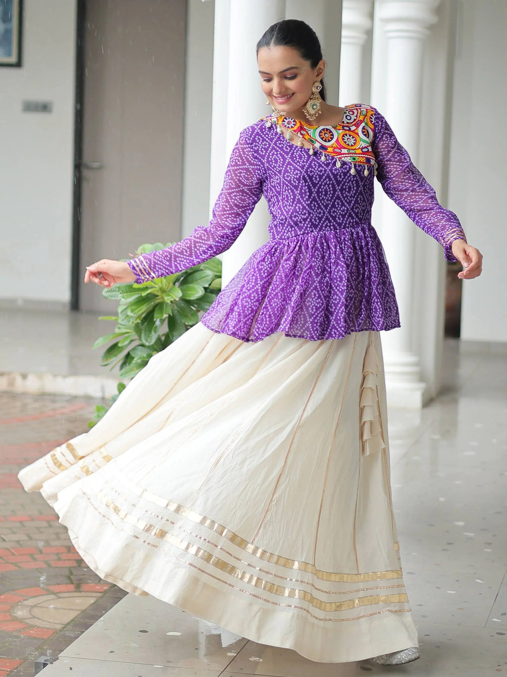 Elegant purple Kora cotton Navratri lehenga set with Bandhani print top and Gota Patti work