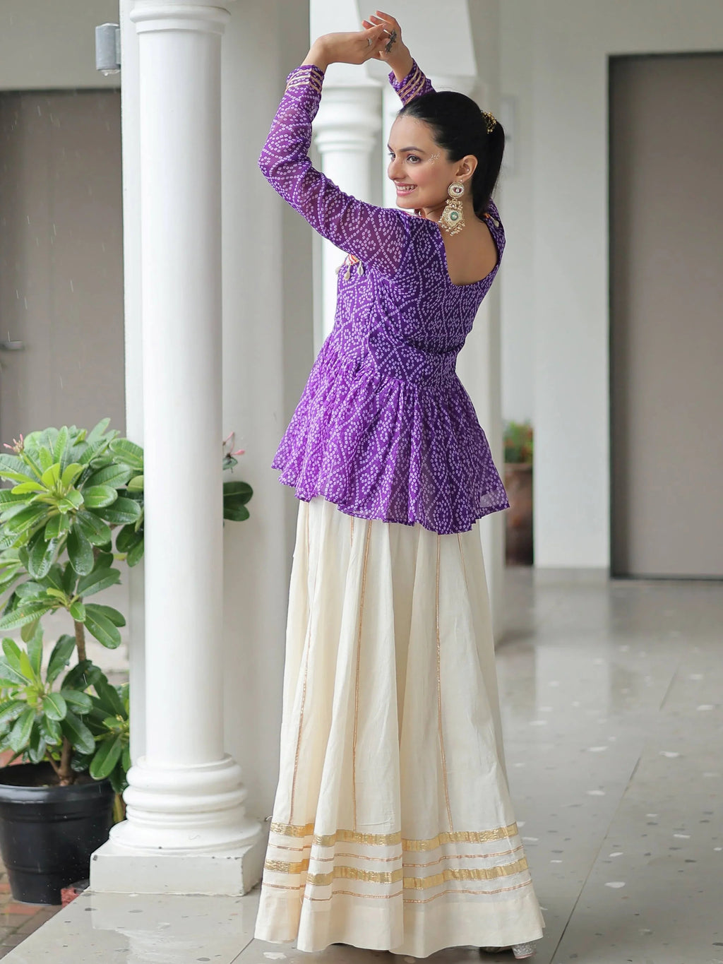 Elegant purple Kora cotton Navratri lehenga set with Bandhani print top and Gota Patti work