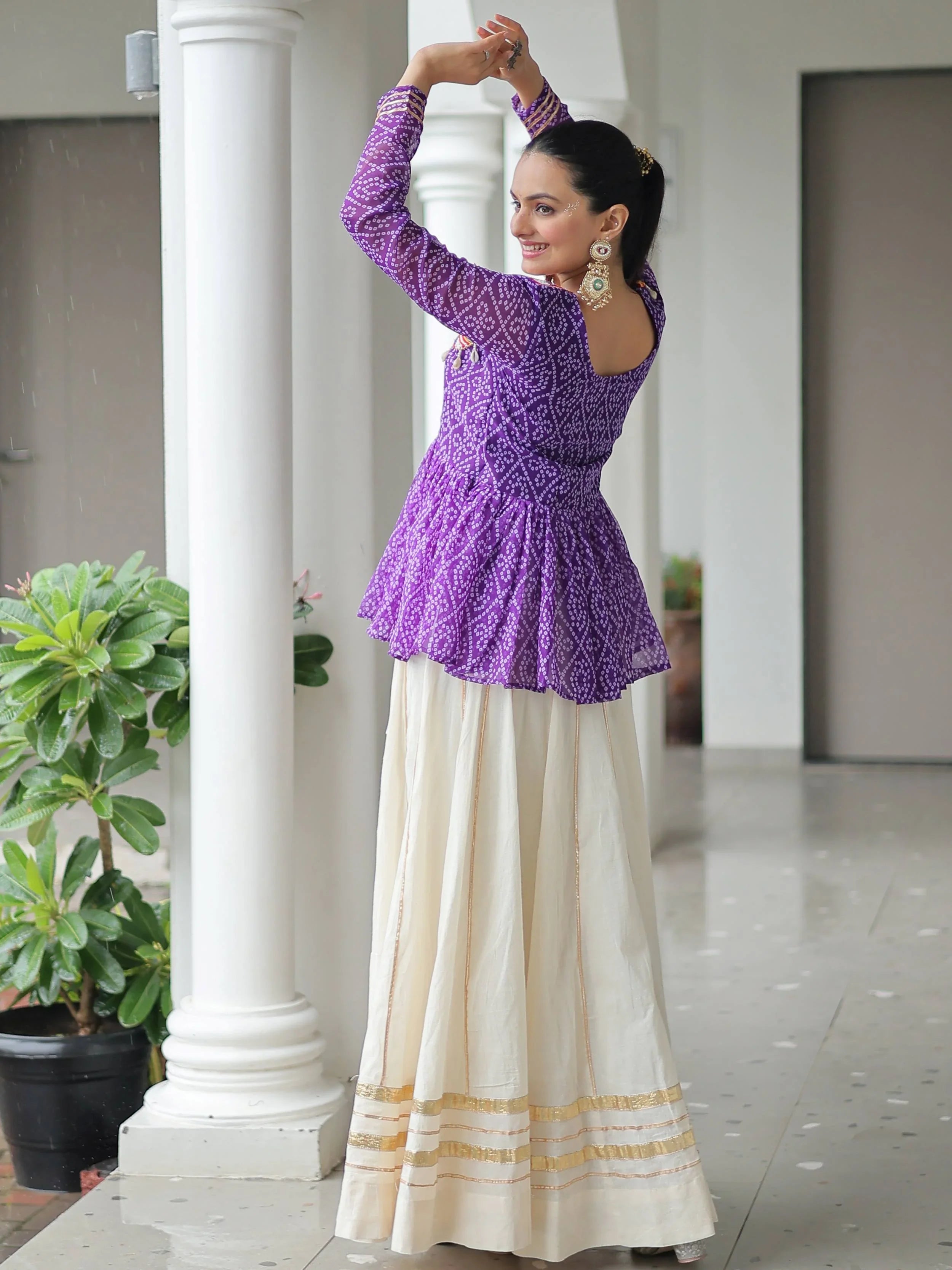 Elegant purple Kora cotton Navratri lehenga set with Bandhani print top and Gota Patti work