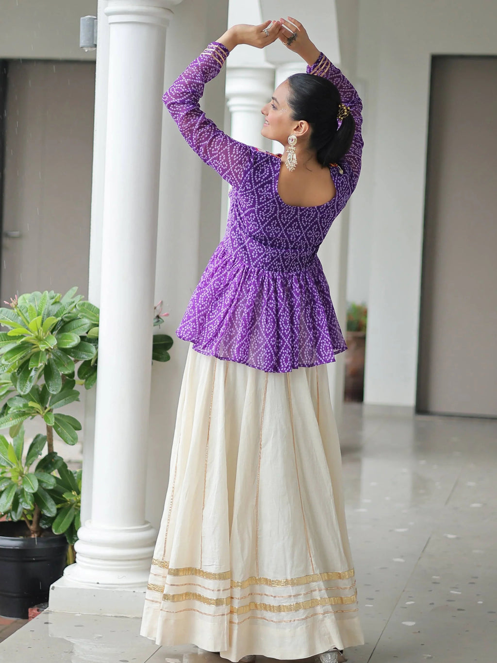 Elegant purple Kora cotton Navratri lehenga set with Bandhani print top and Gota Patti work