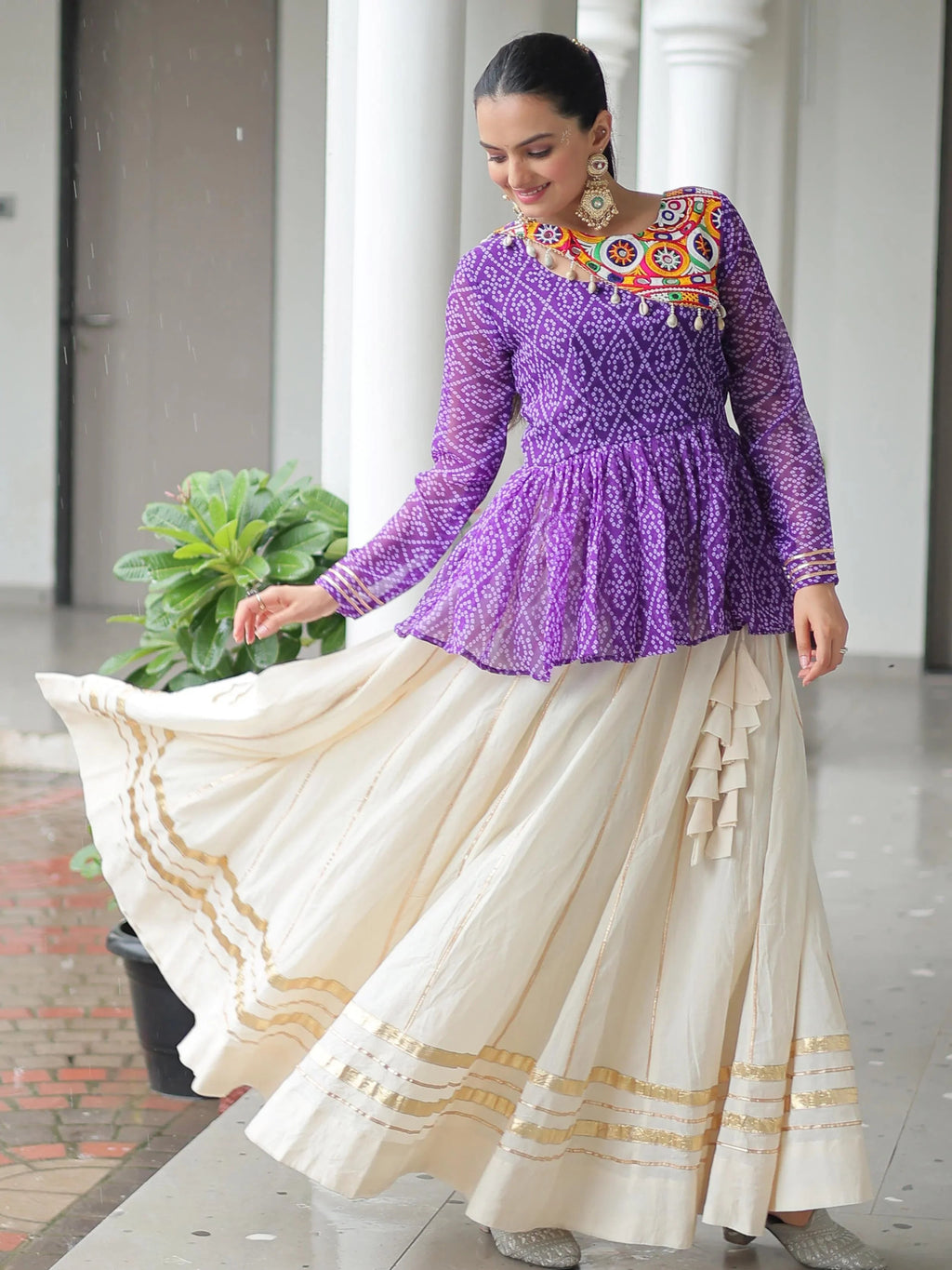 Elegant purple Kora cotton Navratri lehenga set with Bandhani print top and Gota Patti work