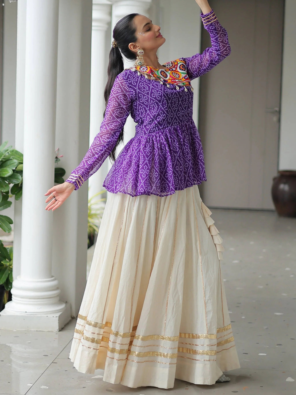 Elegant purple Kora cotton Navratri lehenga set with Bandhani print top and Gota Patti work