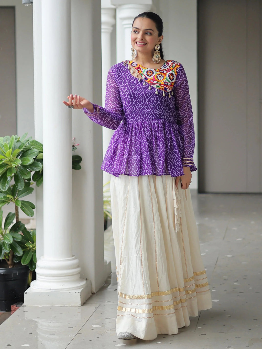 Elegant purple Kora cotton Navratri lehenga set with Bandhani print top and Gota Patti work
