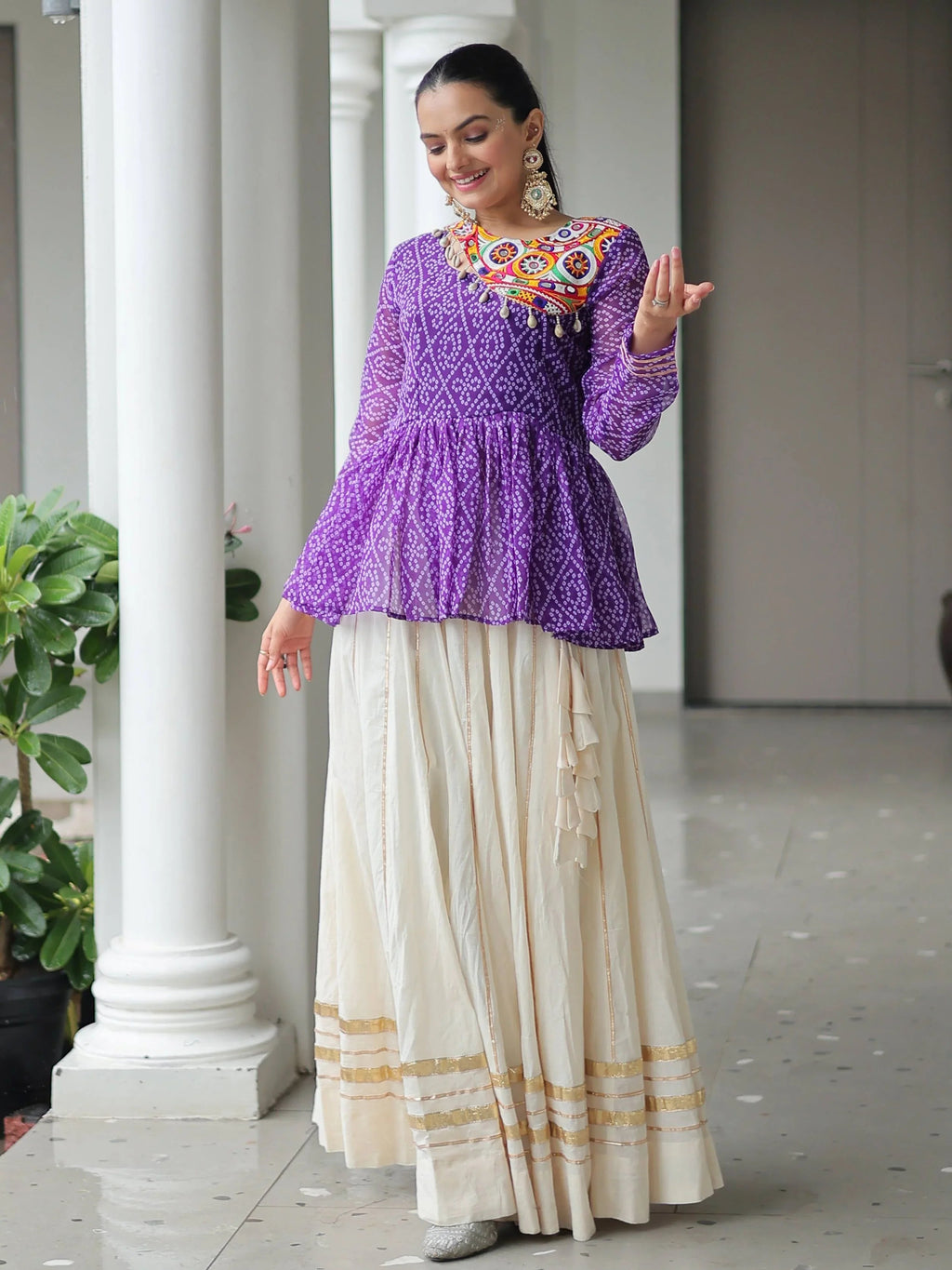 Elegant purple Kora cotton Navratri lehenga set with Bandhani print top and Gota Patti work