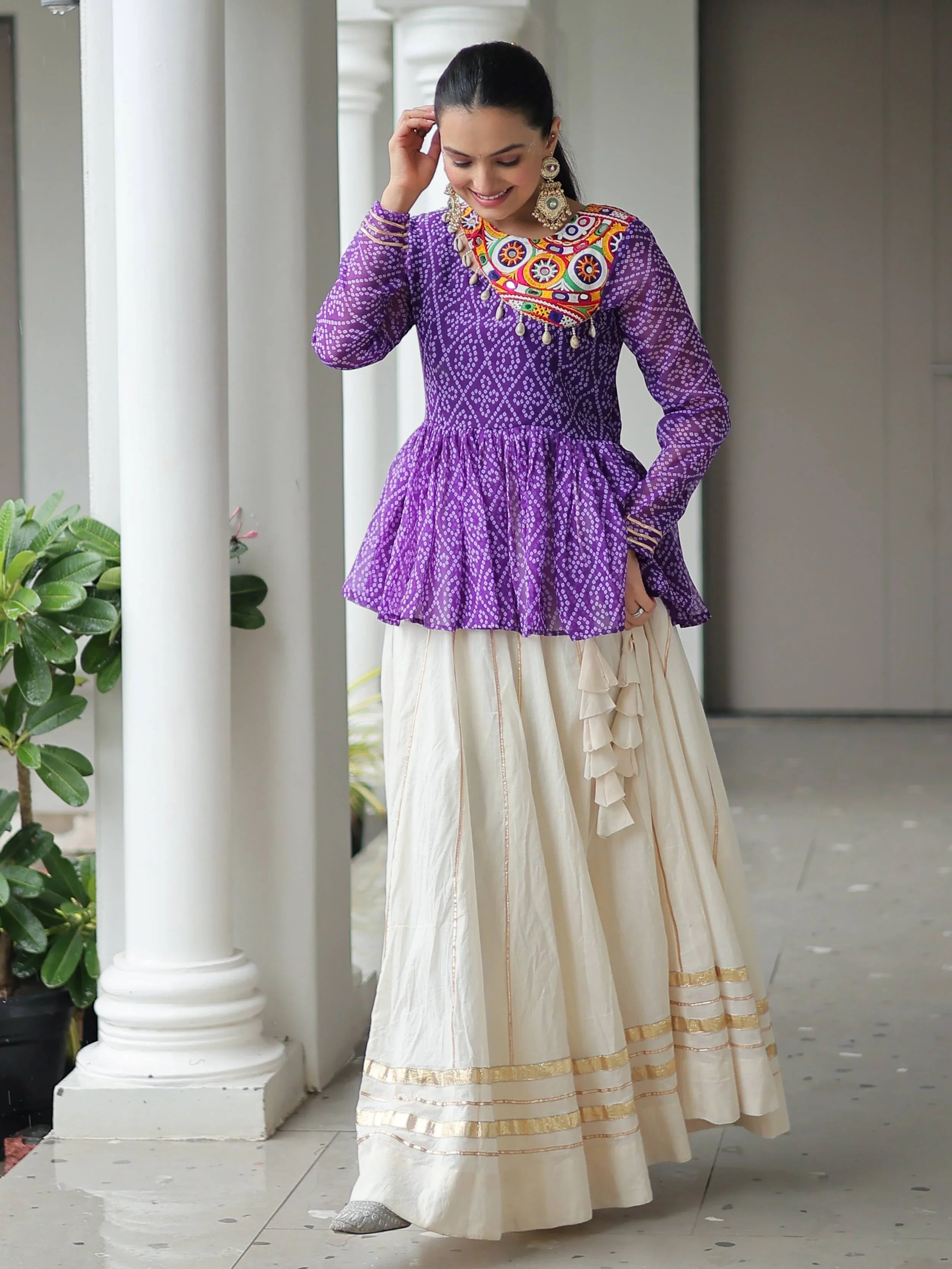 Elegant purple Kora cotton Navratri lehenga set with Bandhani print top and Gota Patti work