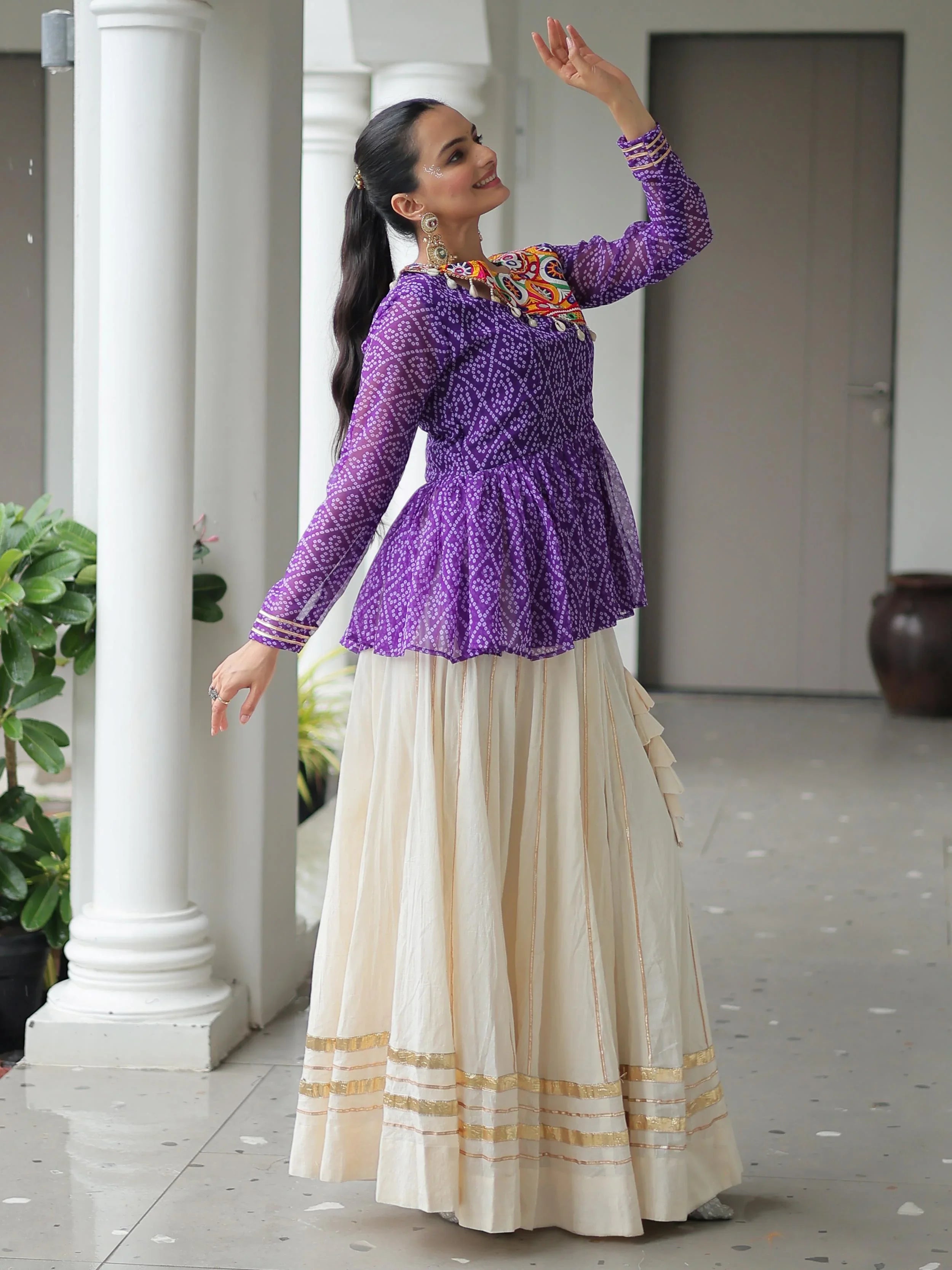 Elegant purple Kora cotton Navratri lehenga set with Bandhani print top and Gota Patti work