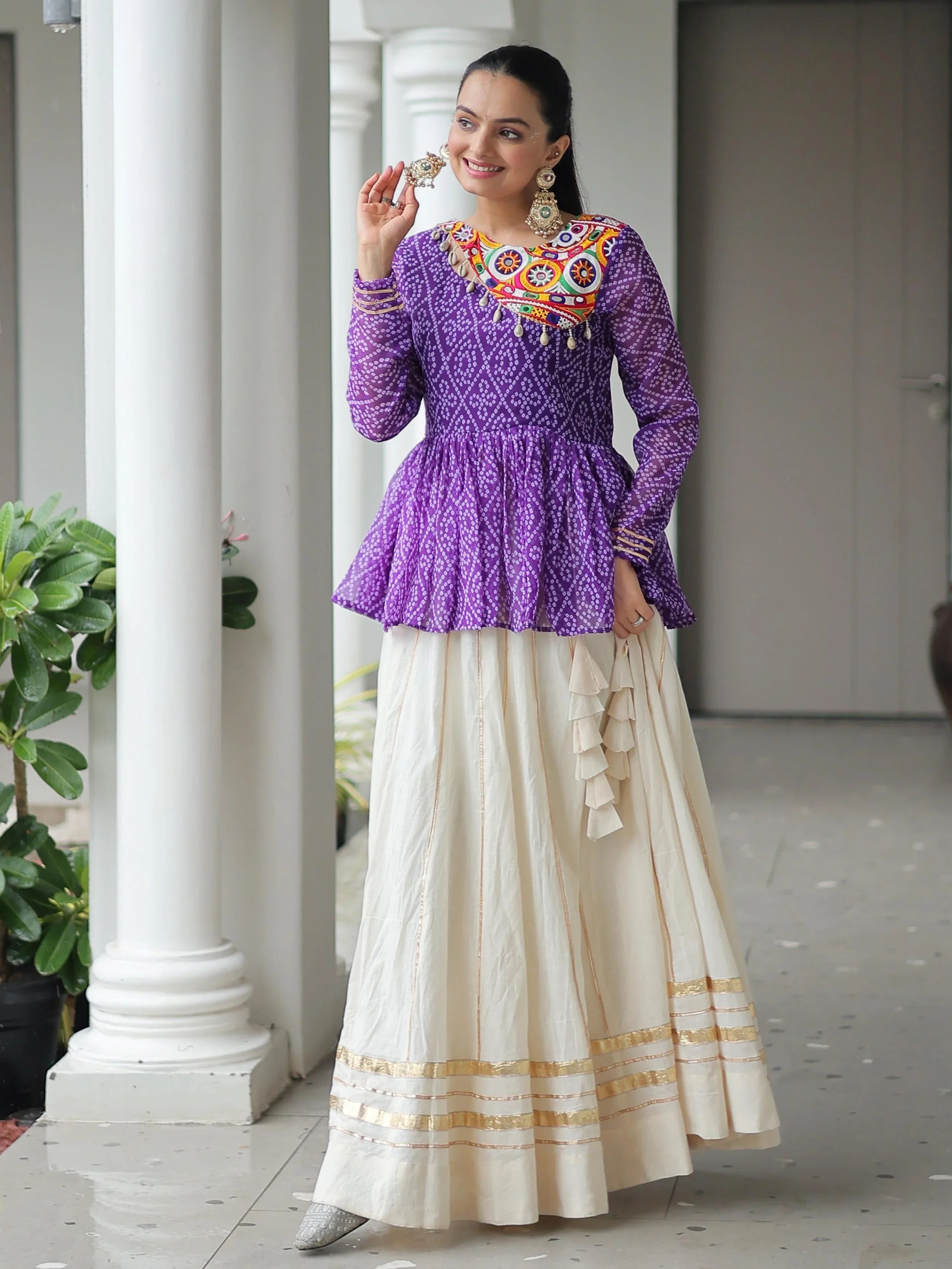 Elegant purple Kora cotton Navratri lehenga set with Bandhani print top and Gota Patti work