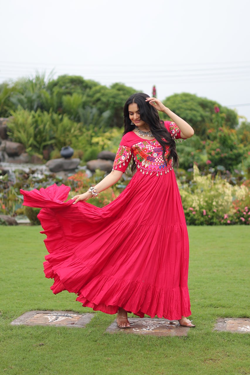 Rani pink pure rayon flair gown with kutchi gamthi embroidery for navratri