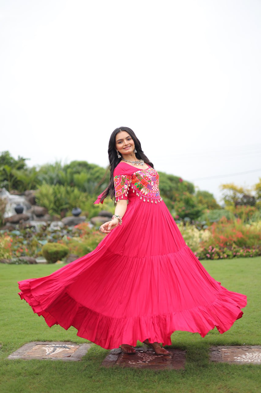 Rani pink pure rayon flair gown with kutchi gamthi embroidery for navratri