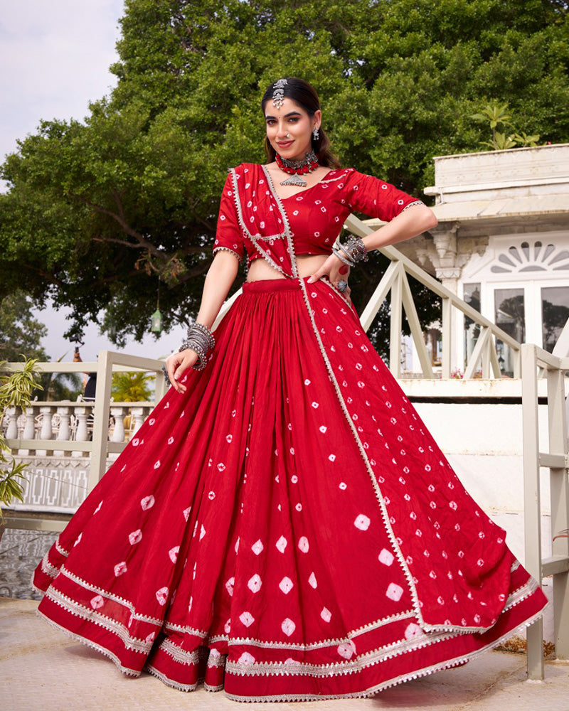 Red pure Chanderi Bandhej print lace work lehenga choli