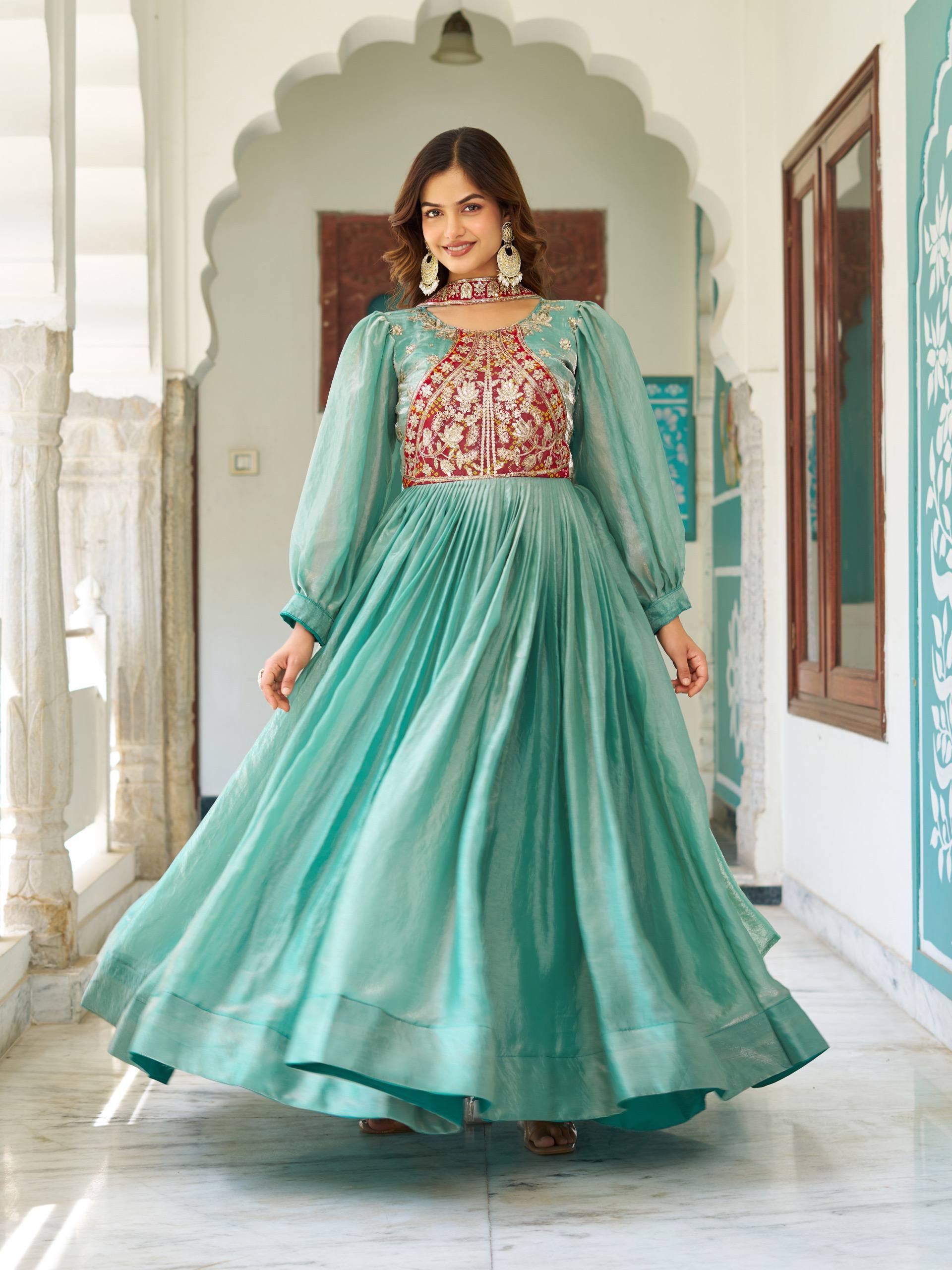 Ritu sea green Fendy silk gown with sequins thread embroidery and dupatta