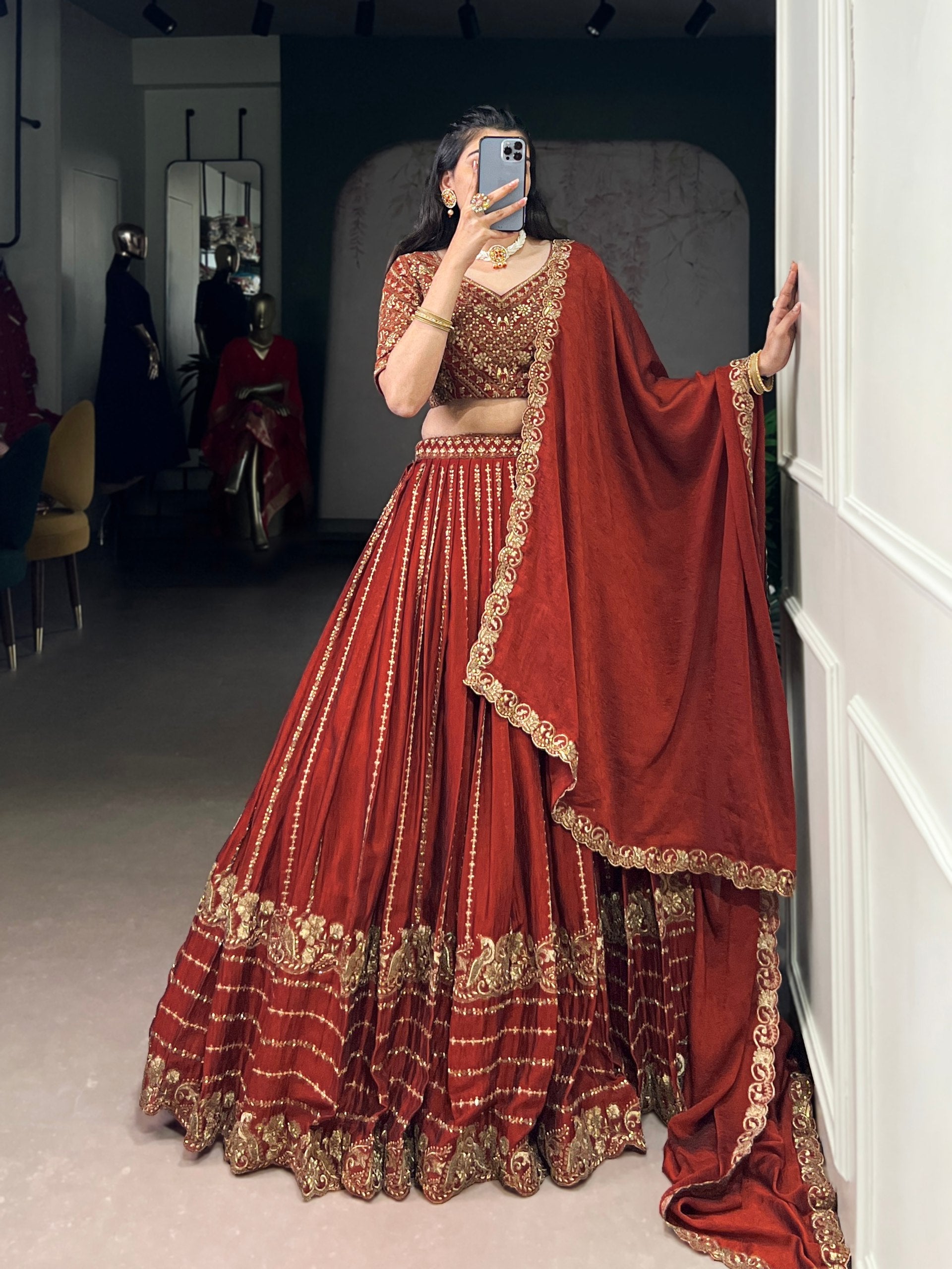 Rust orange silk lehenga choli with sequins thread embroidery