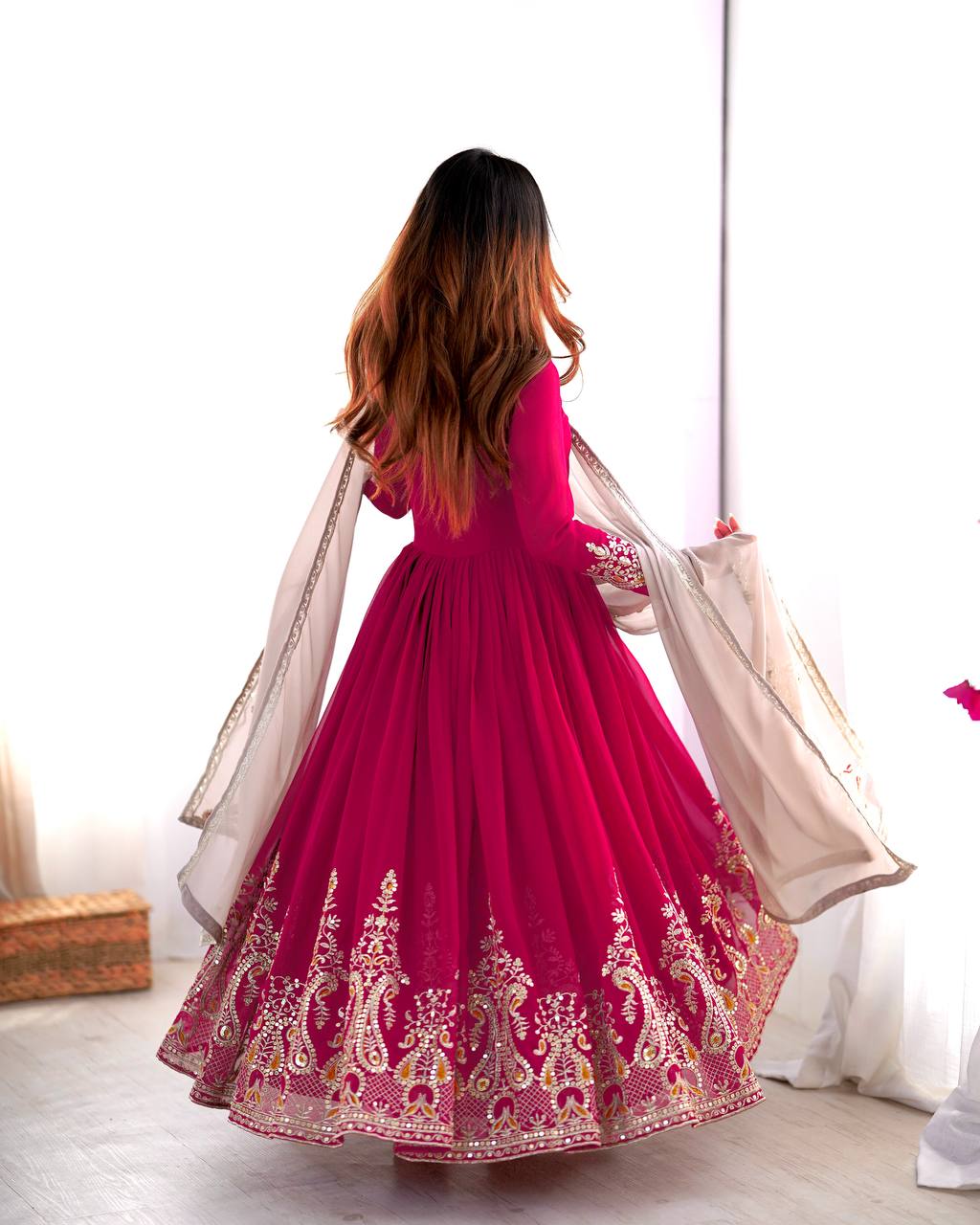 Pink georgette embroidered Tejvini designer gown