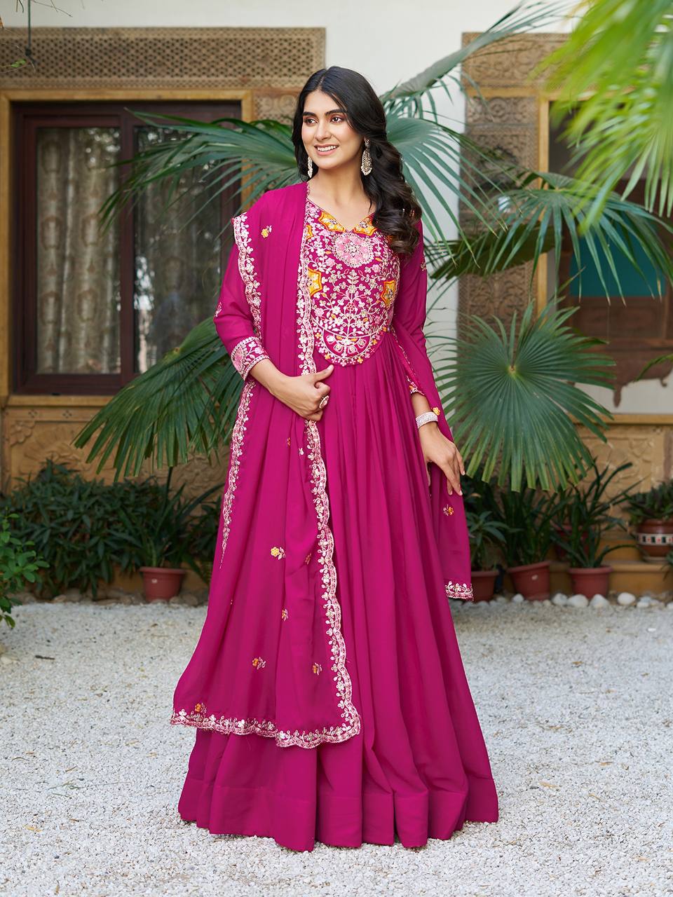 Pink heavy sequins thread embroidered georgette gown for wedding functions