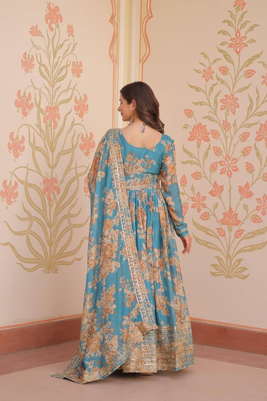 Teal blue Russian silk printed gown with embroidered sequins work and dupatta