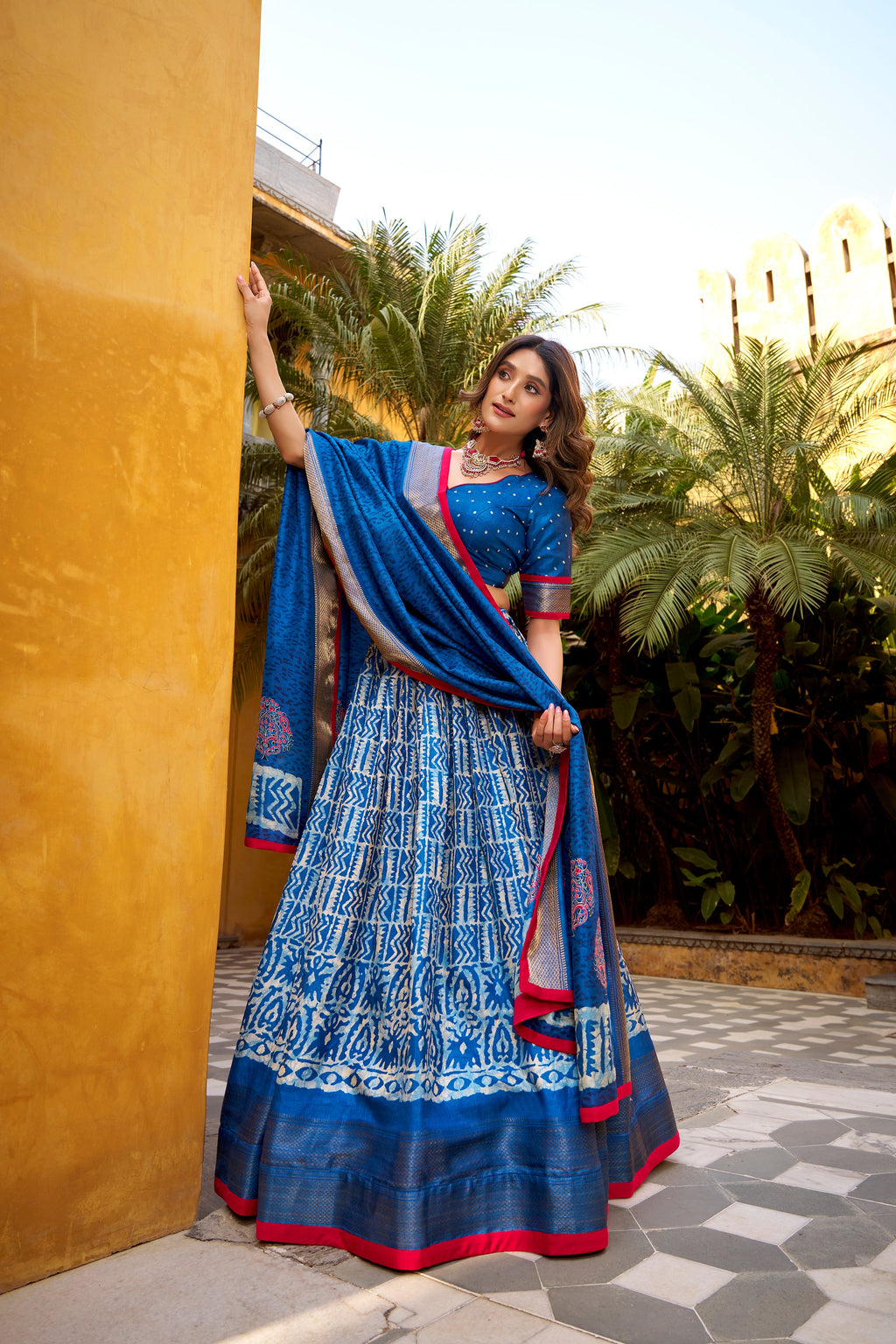 Girija blue Dola silk batik print lehenga choli with zari weaving work