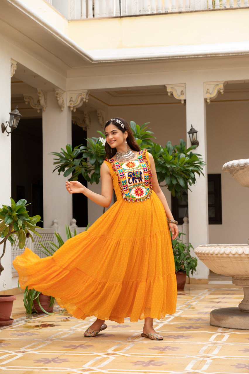 Yellow faux georgette Bandhani print Kutchi patch mirror work gown
