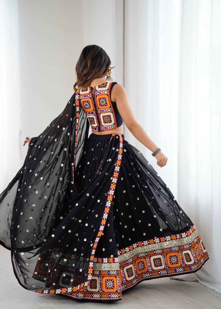 Black georgette lehenga choli with Gamthi embroidery and mirror work