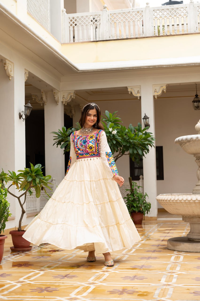 Off-white cotton gown with Kutchi Gamthi mirror embroidery and lace
