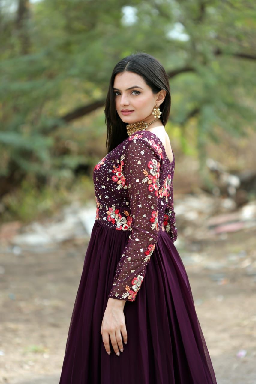 Radiant charisma embroidered sequin adorned double frill gown