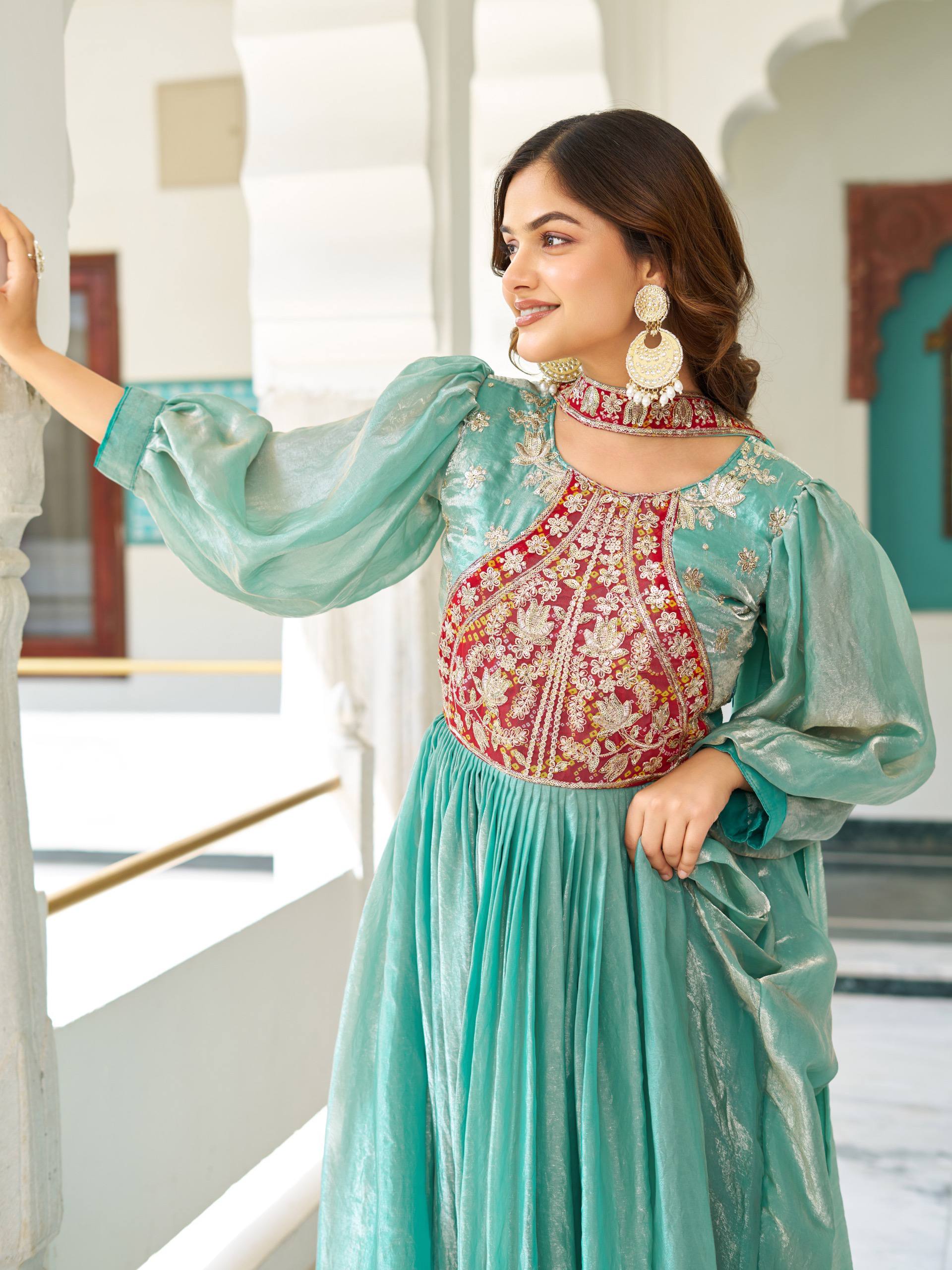 Ritu sea green Fendy silk gown with sequins thread embroidery and dupatta