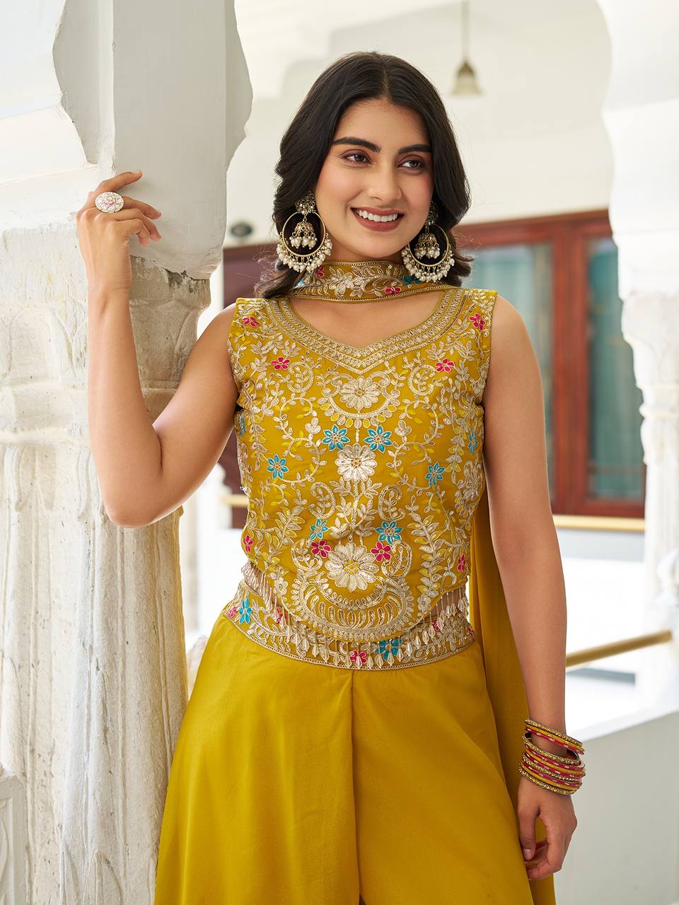 Stuti mustard yellow star georgette top palazzo set with sequins thread embroidery