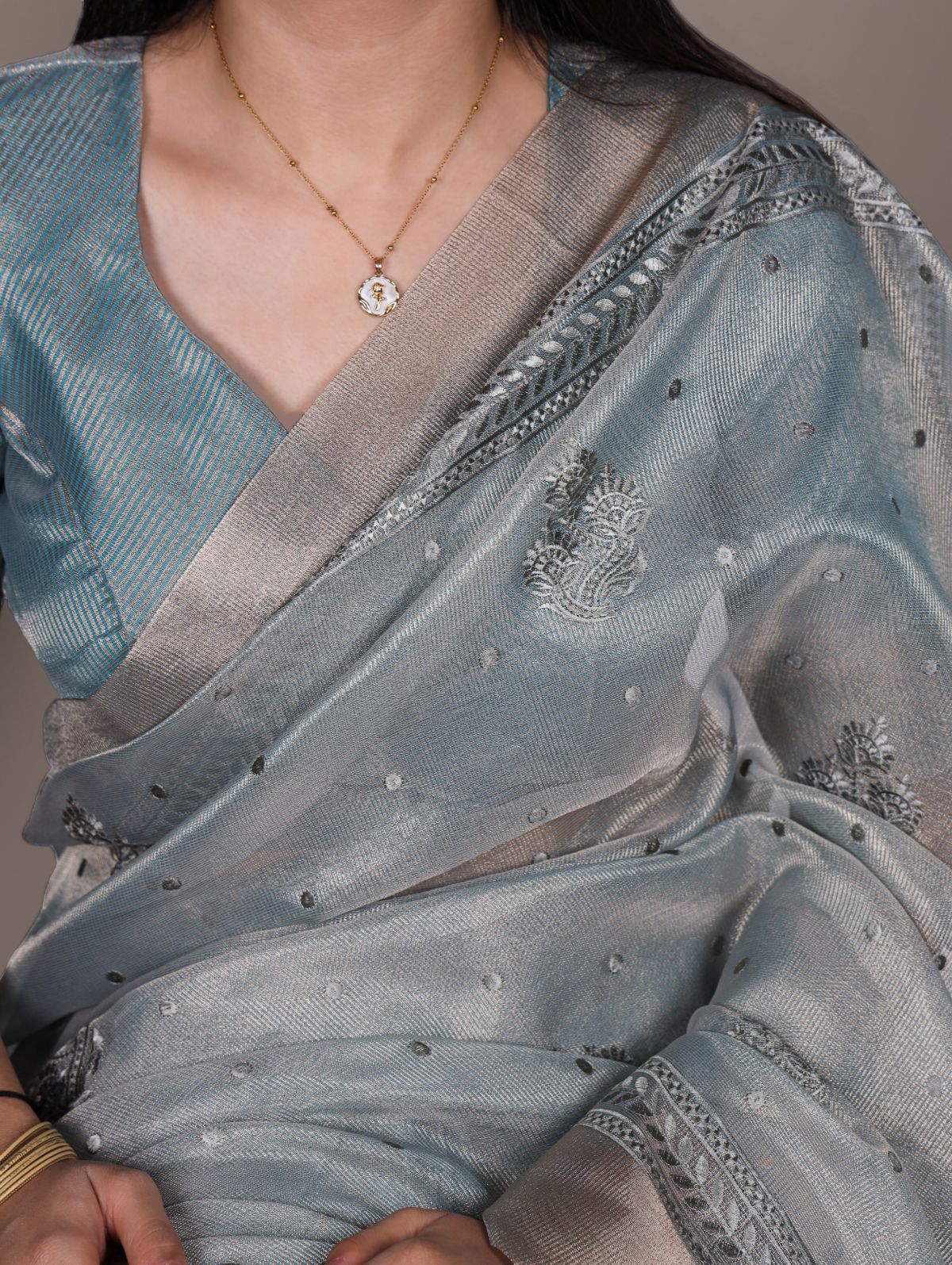 Sky blue poly shimmer thread embroidered saree with unstitched blouse