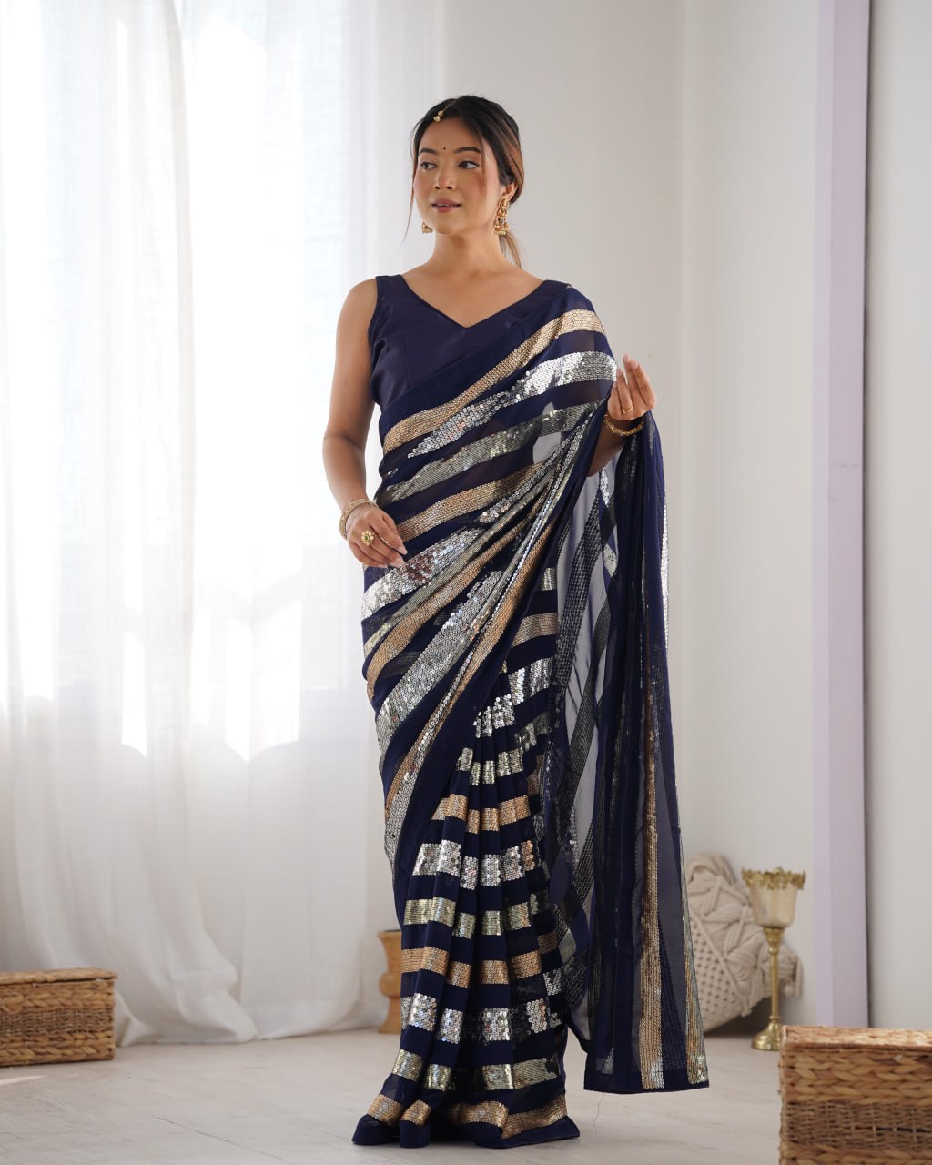 Deep blue georgette sequin embroidered Kira designer saree