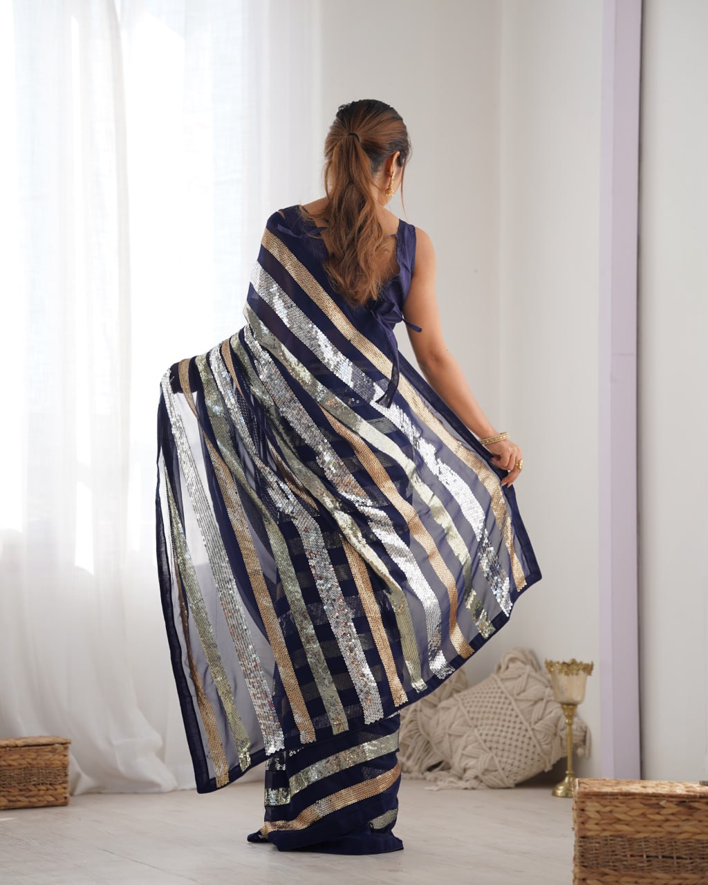 Deep blue georgette sequin embroidered Kira designer saree