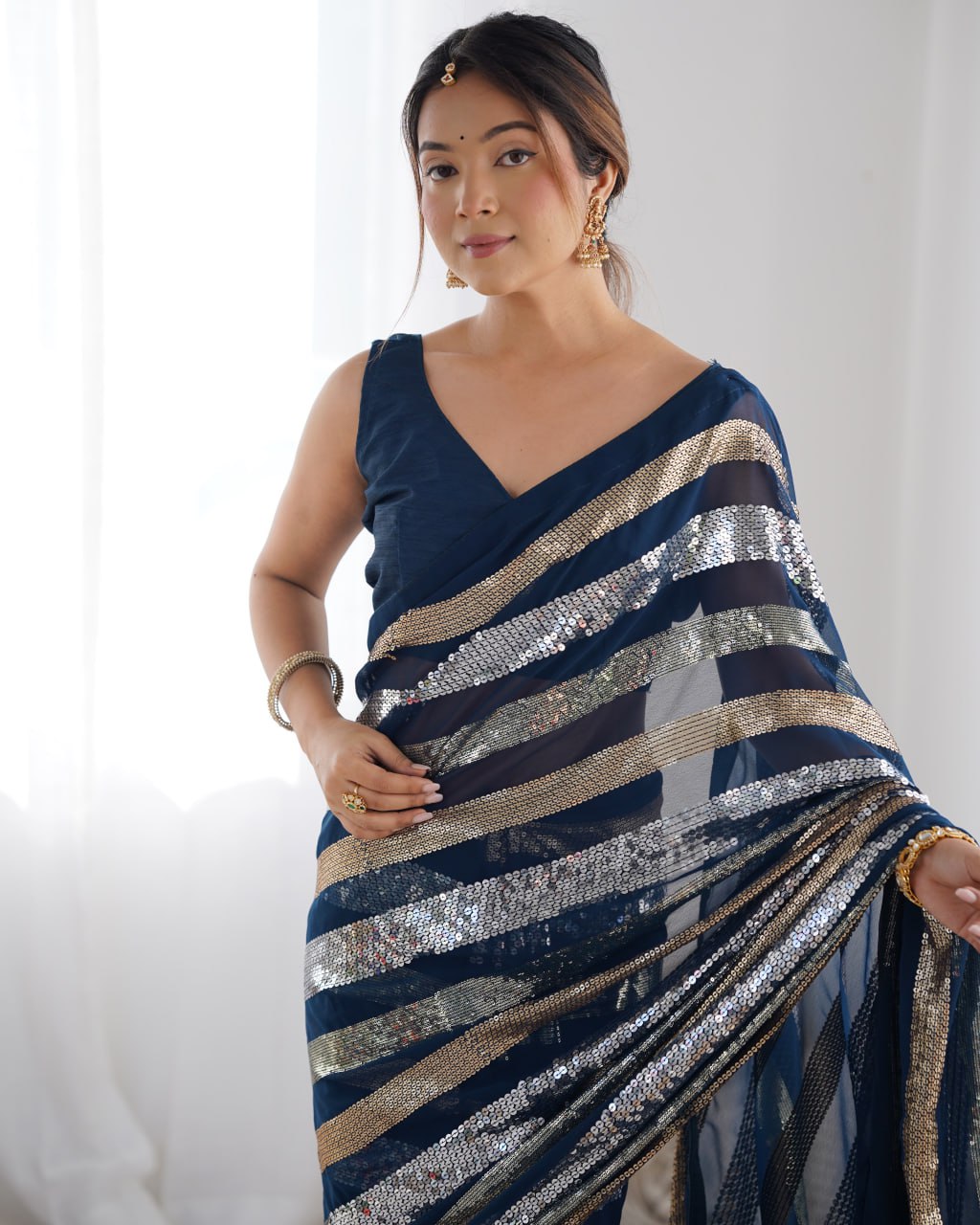 Navy blue georgette sequin embroidered Kira designer saree
