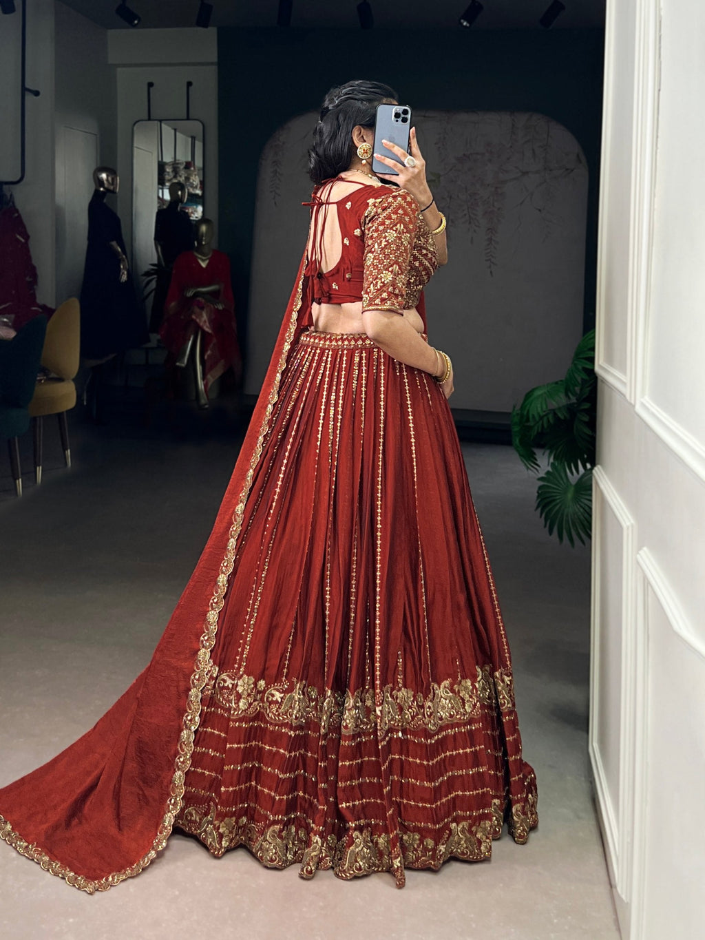 Rust orange silk lehenga choli with sequins thread embroidery