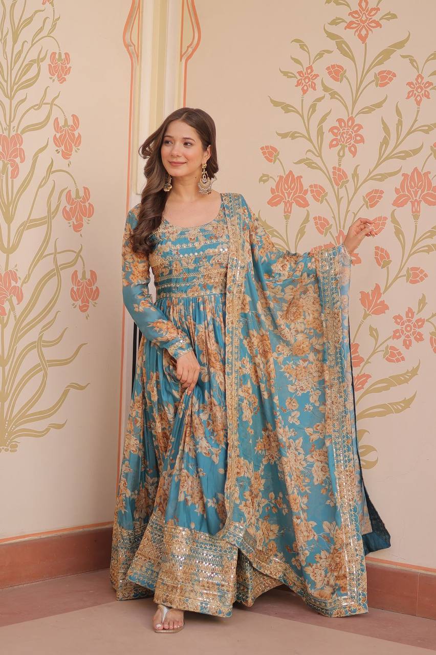Teal blue Russian silk printed gown with embroidered sequins work and dupatta