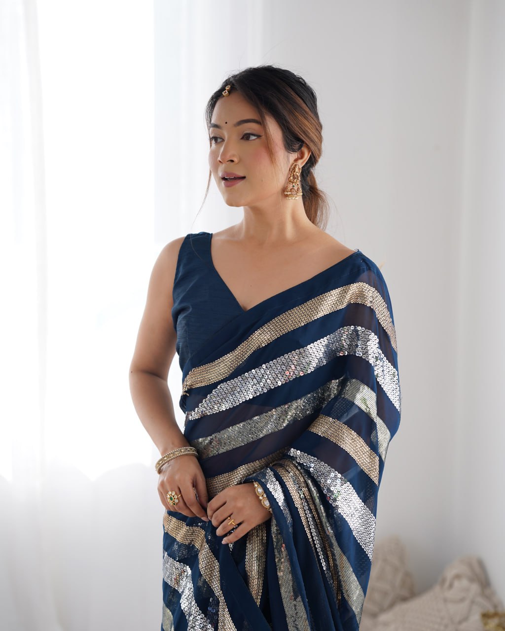 Navy blue georgette sequin embroidered Kira designer saree